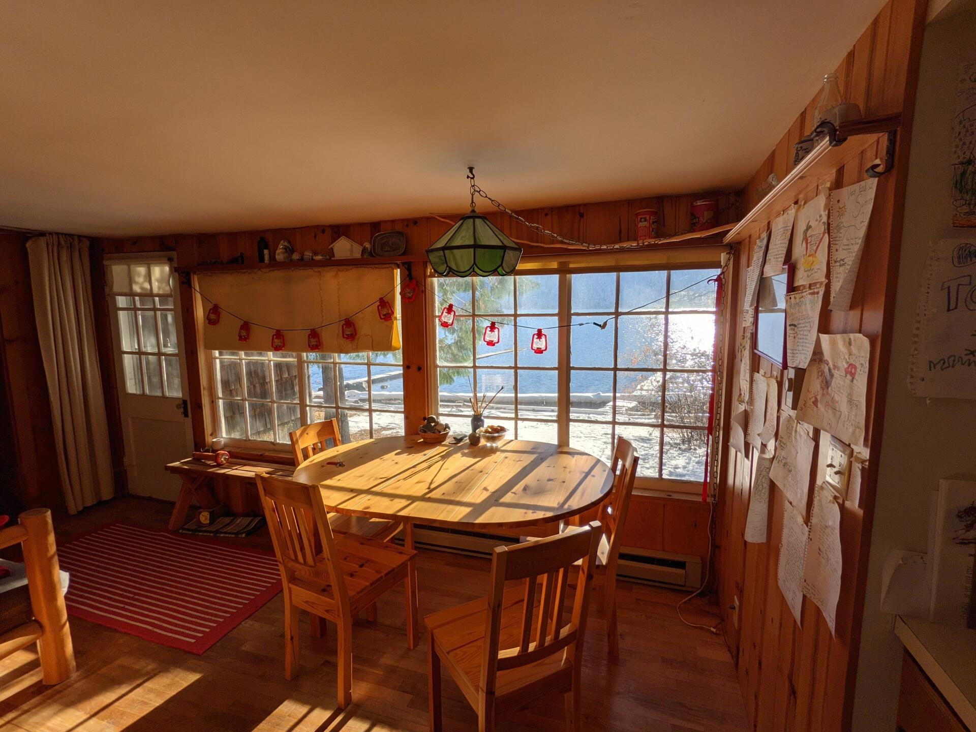 BEFORE - A modern lake house on Lake Wenatchee is built entirely around a preserved 1915 log cabin, turning history into the home’s centerpiece.