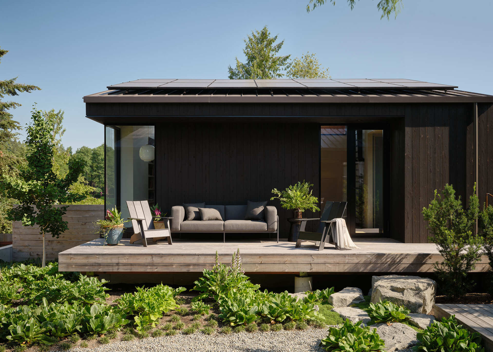 A Northeast Seattle remodel that transforms a modest 1940s ranch into a flexible two building family home focused on sustainability and long term use.