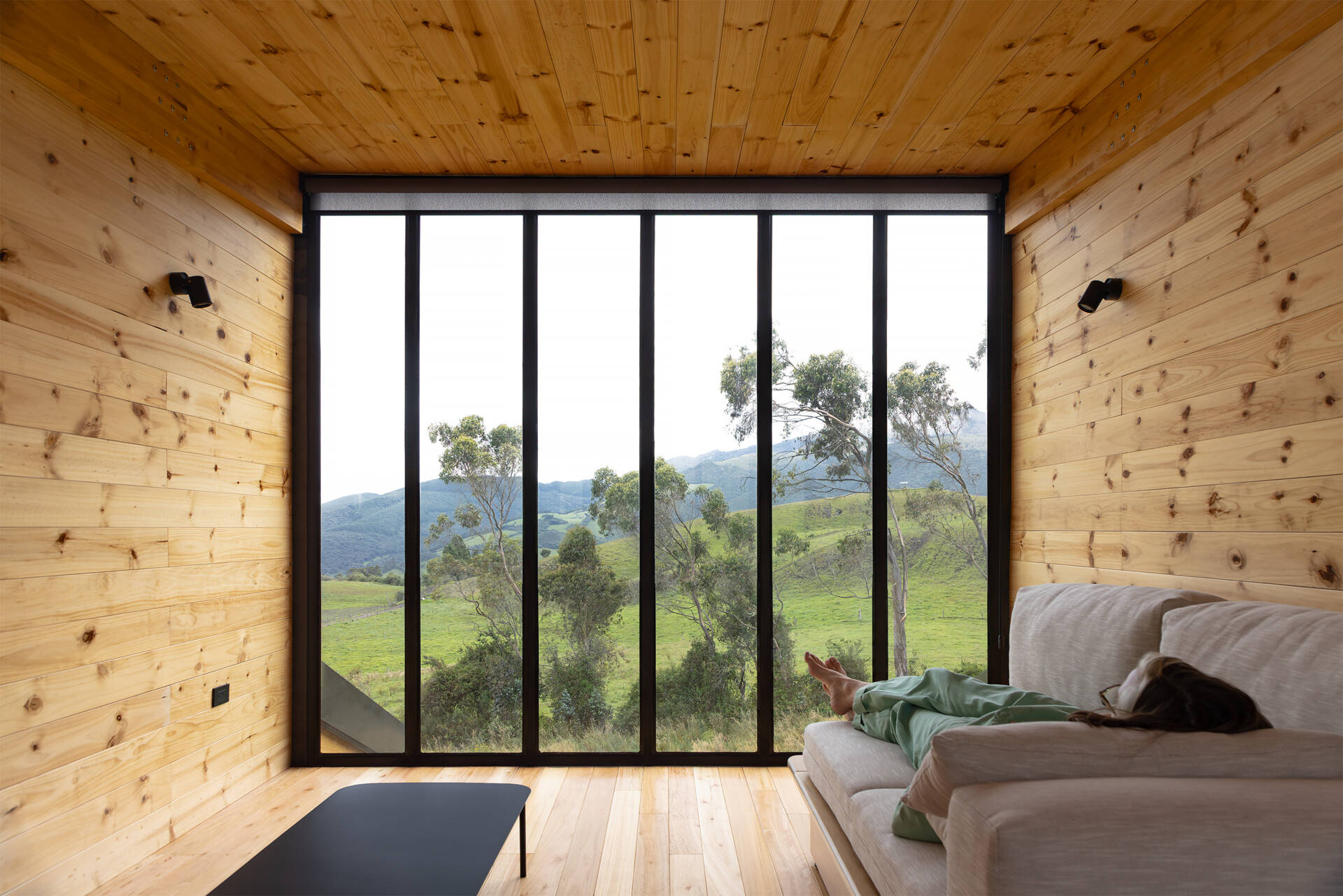 A small viewing loft opens to both north and south, offering direct sightlines to the closest volcanoes.