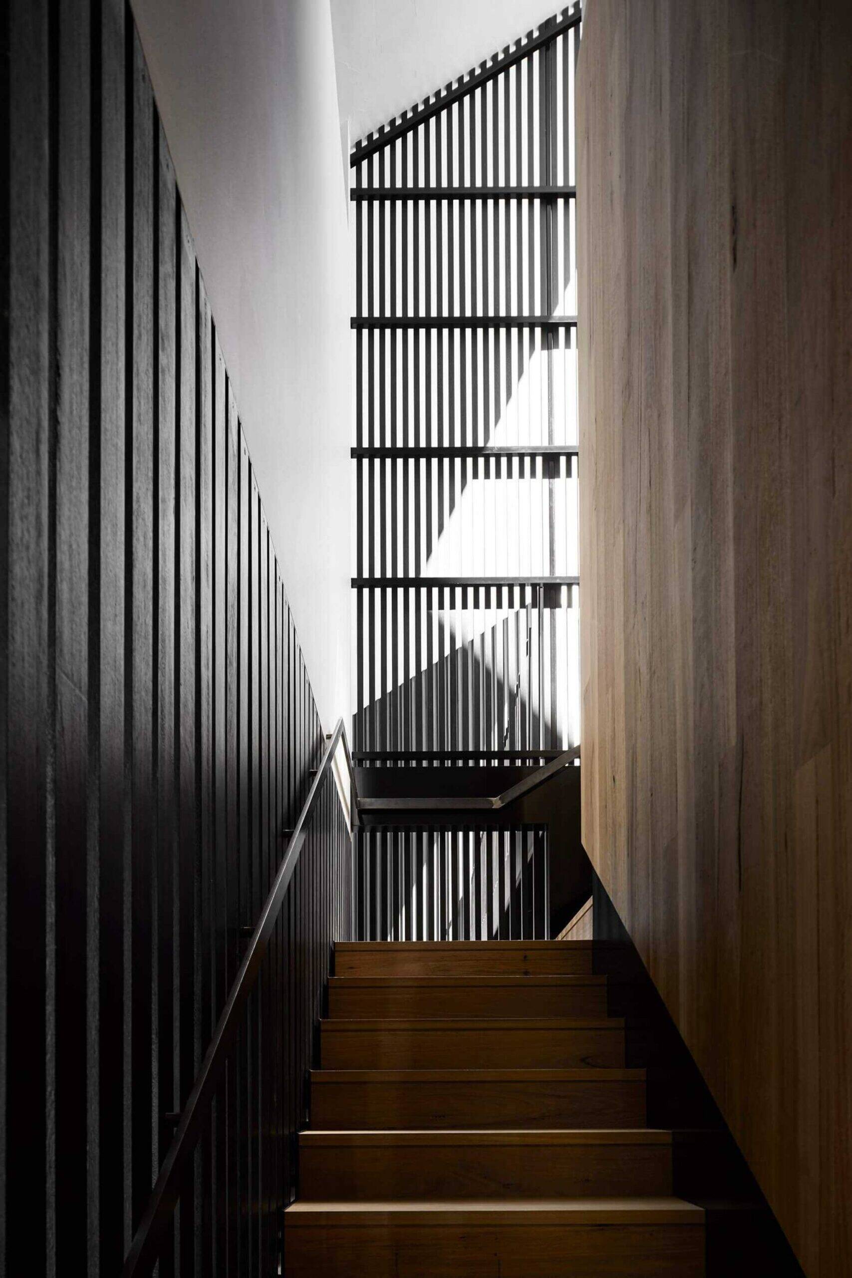 An opening provides access to the stairs leading up to the second floor.