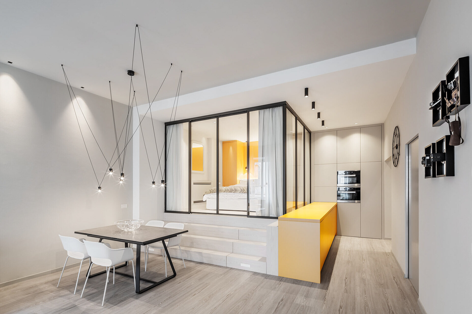 A small apartment in Trento, Italy, redesigned by Studio Raro to feel light, elegant, and unexpectedly luxurious using clever spatial planning.