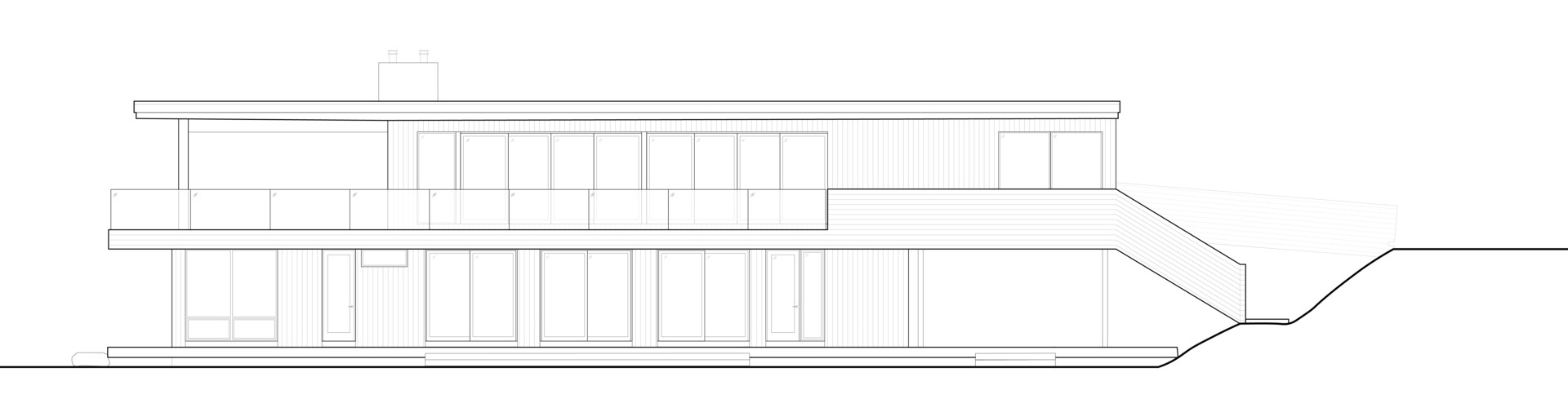 Long Lake Cottage brings together elevated living spaces, grounded materials, and a layout shaped by both landscape and lifestyle. By placing shared areas above and private rooms below, the design opens the home to views while keeping a strong connection to the forest floor.