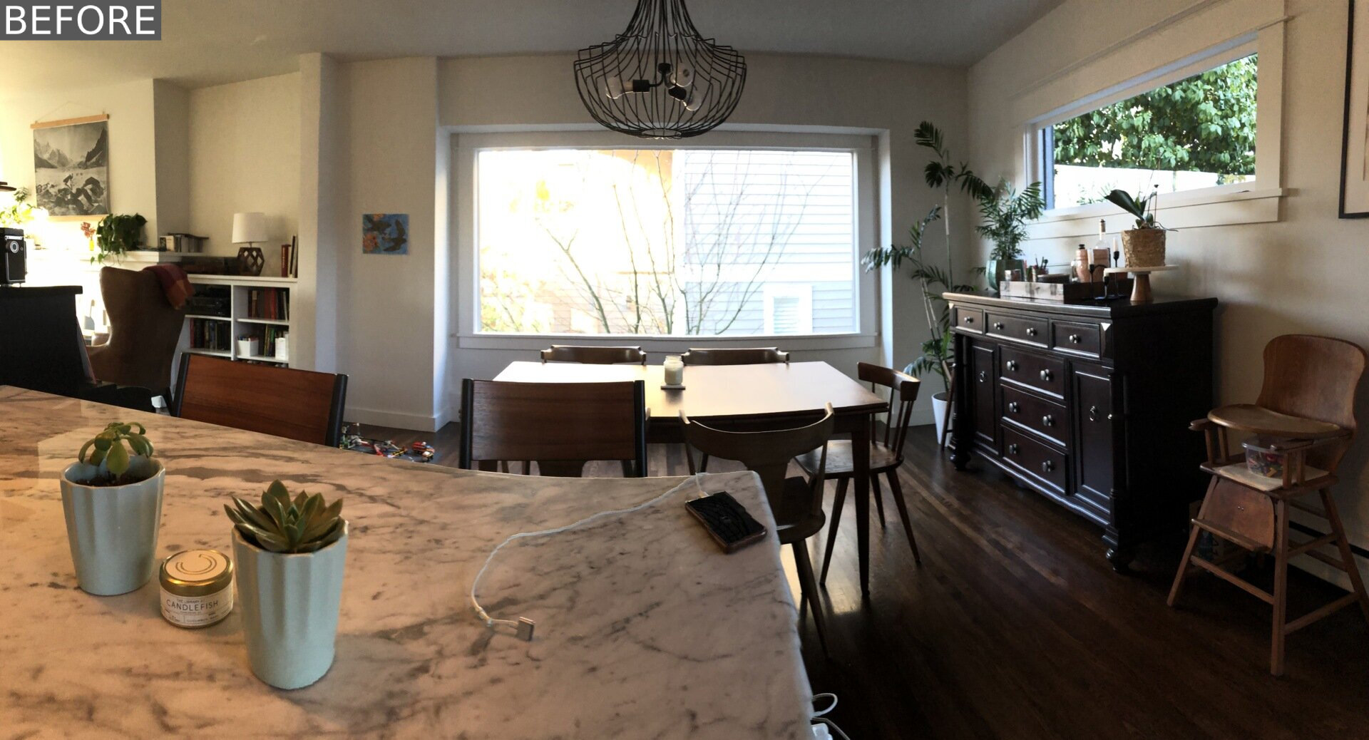 BEFORE RENOVATION - An elevated kitchen and dining space is reimagined for better flow, now connecting seamlessly to the rest of the home and outdoors.