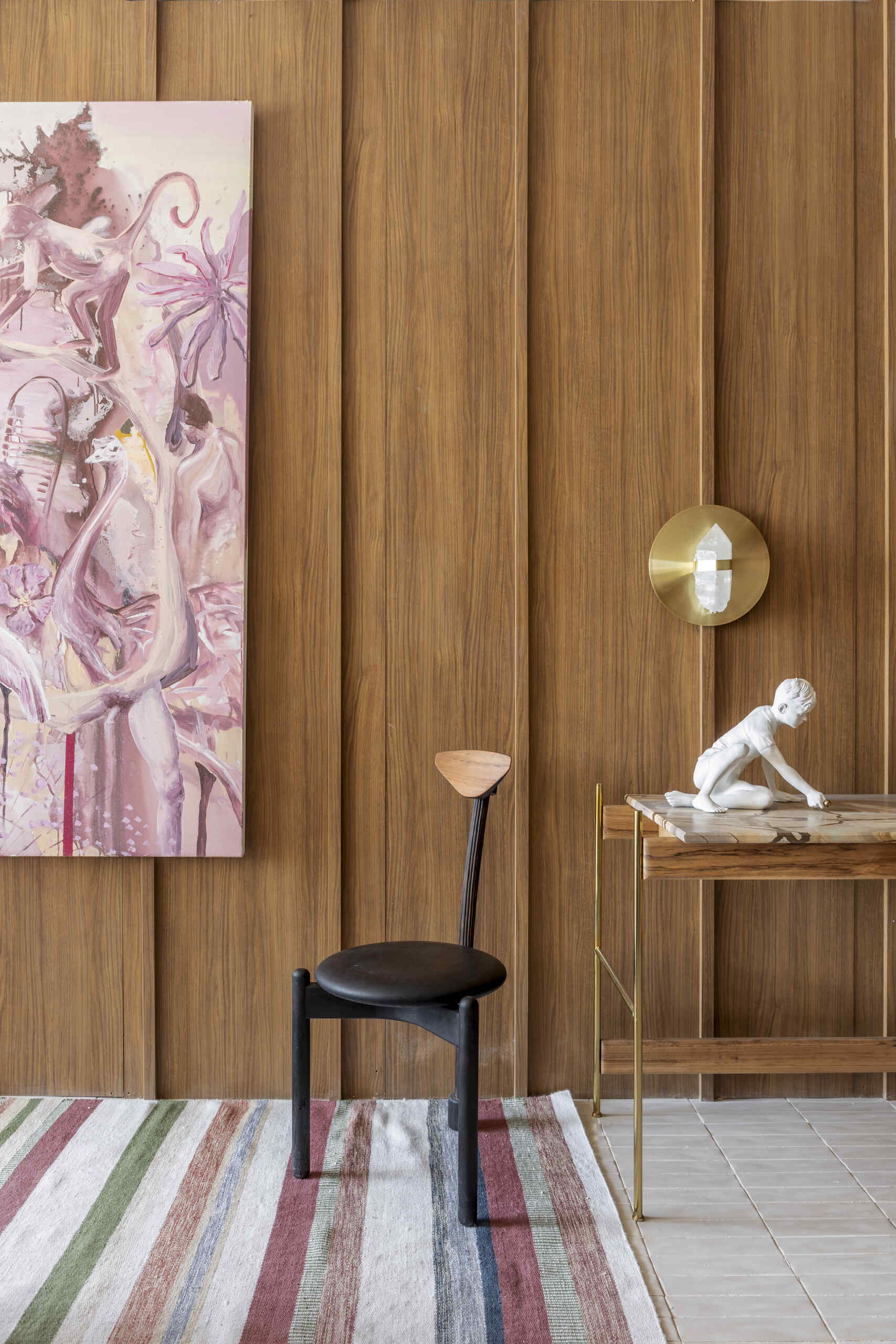 Warm tones transform the bedroom into a calm, restful space, creating a clear contrast from the social areas.