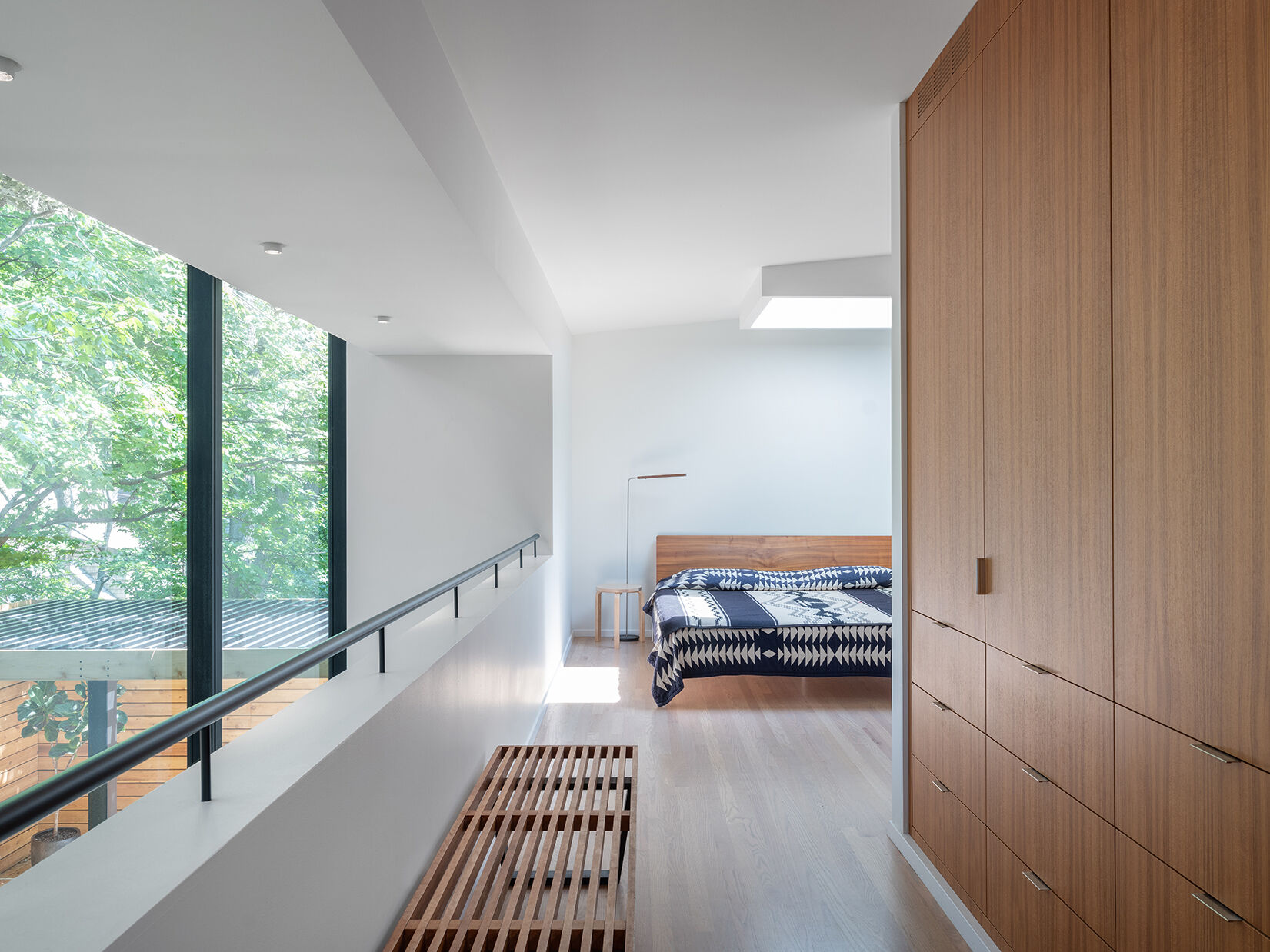 In the bedroom suite, a new layout introduces multiple bedrooms, a closet, and bathrooms, making better use of the upper level.