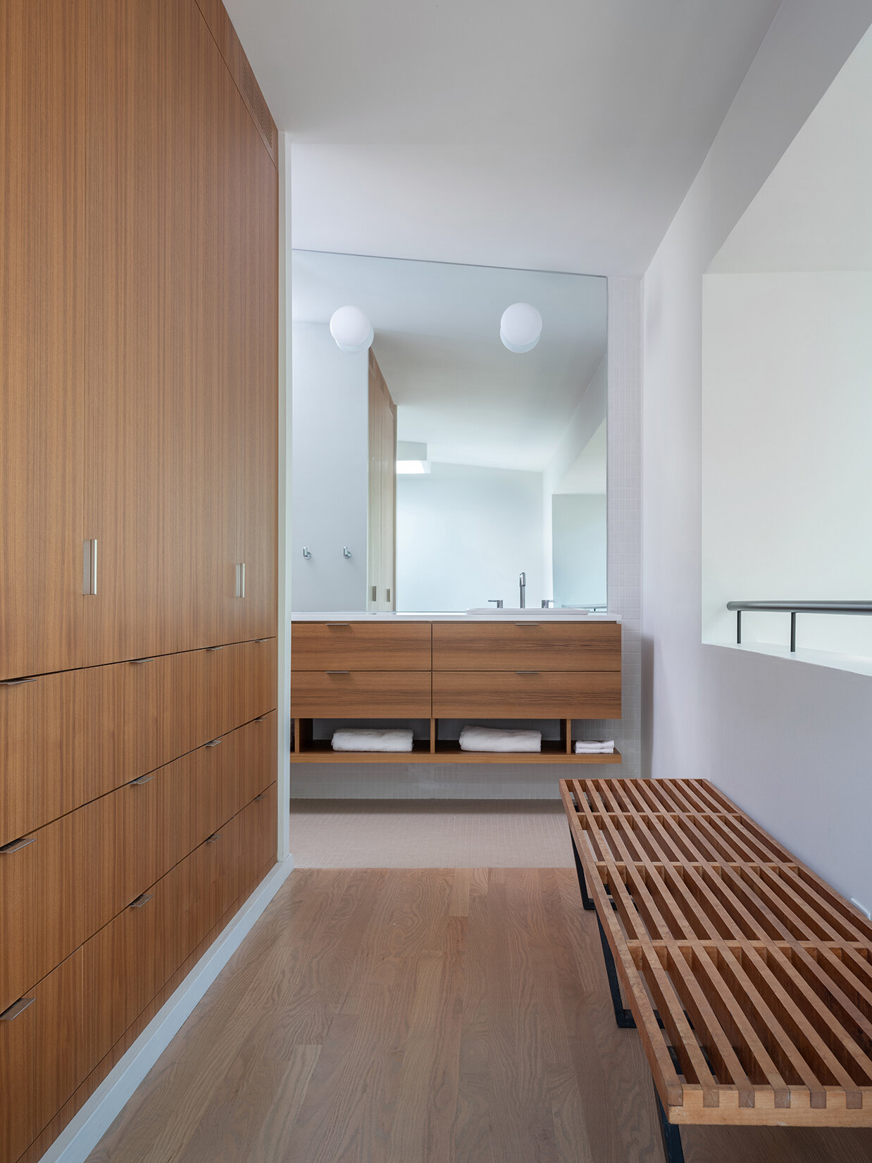 In the bedroom suite, a new layout introduces multiple bedrooms, a closet, and bathrooms, making better use of the upper level.