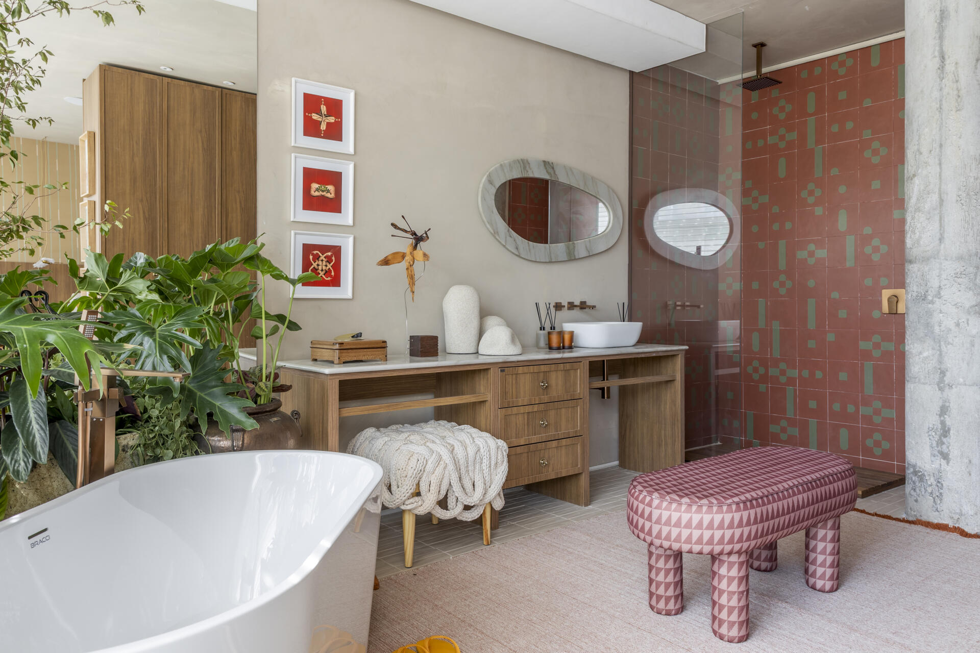 A warm, refined bathroom that continues the softer palette of the private areas for a cohesive feel.