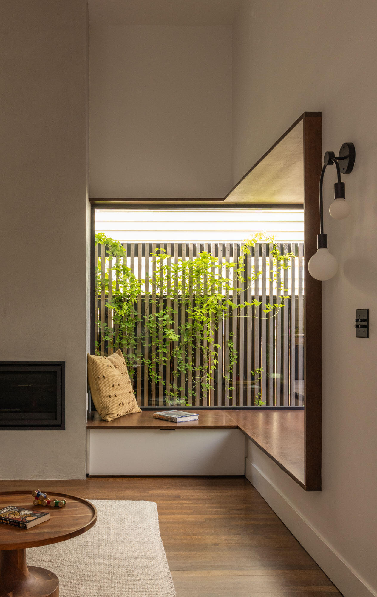 A sunken family room becomes the heart of the home, offering a cozy yet open space for everyday gathering and relaxation.