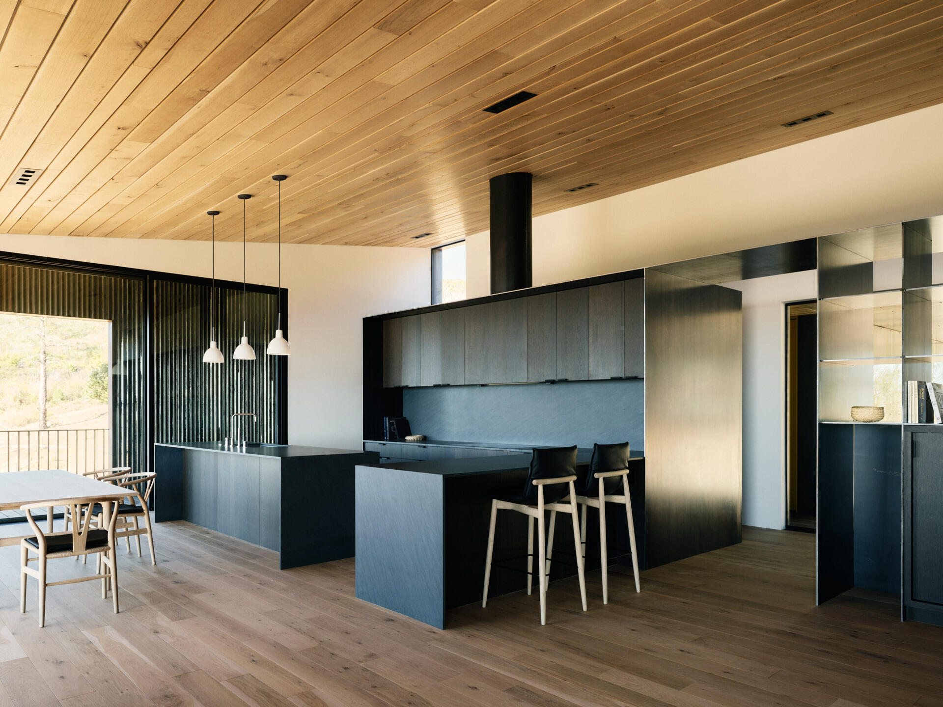 With wheelchair clearances and a future-ready layout, this black kitchen supports long-term living without compromise.