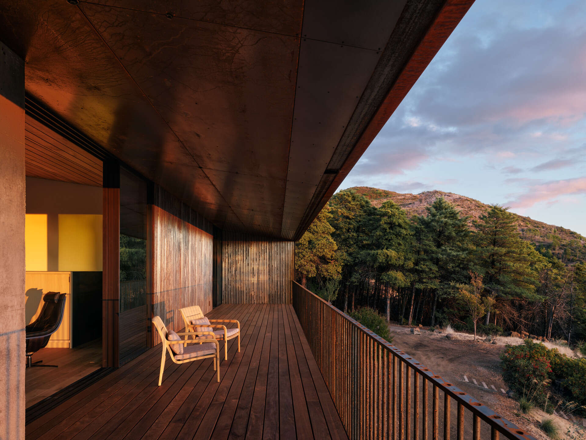 This elevated deck is designed with overhead sprinklers and smart drainage, turning outdoor living into a more resilient experience.