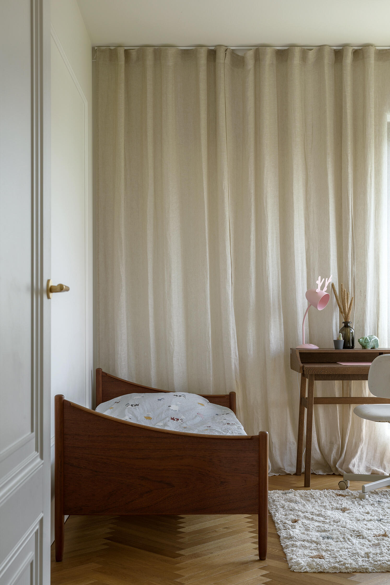 A kids bedroom that blends function with soft, minimal design for a cohesive look that matches the rest of the home.