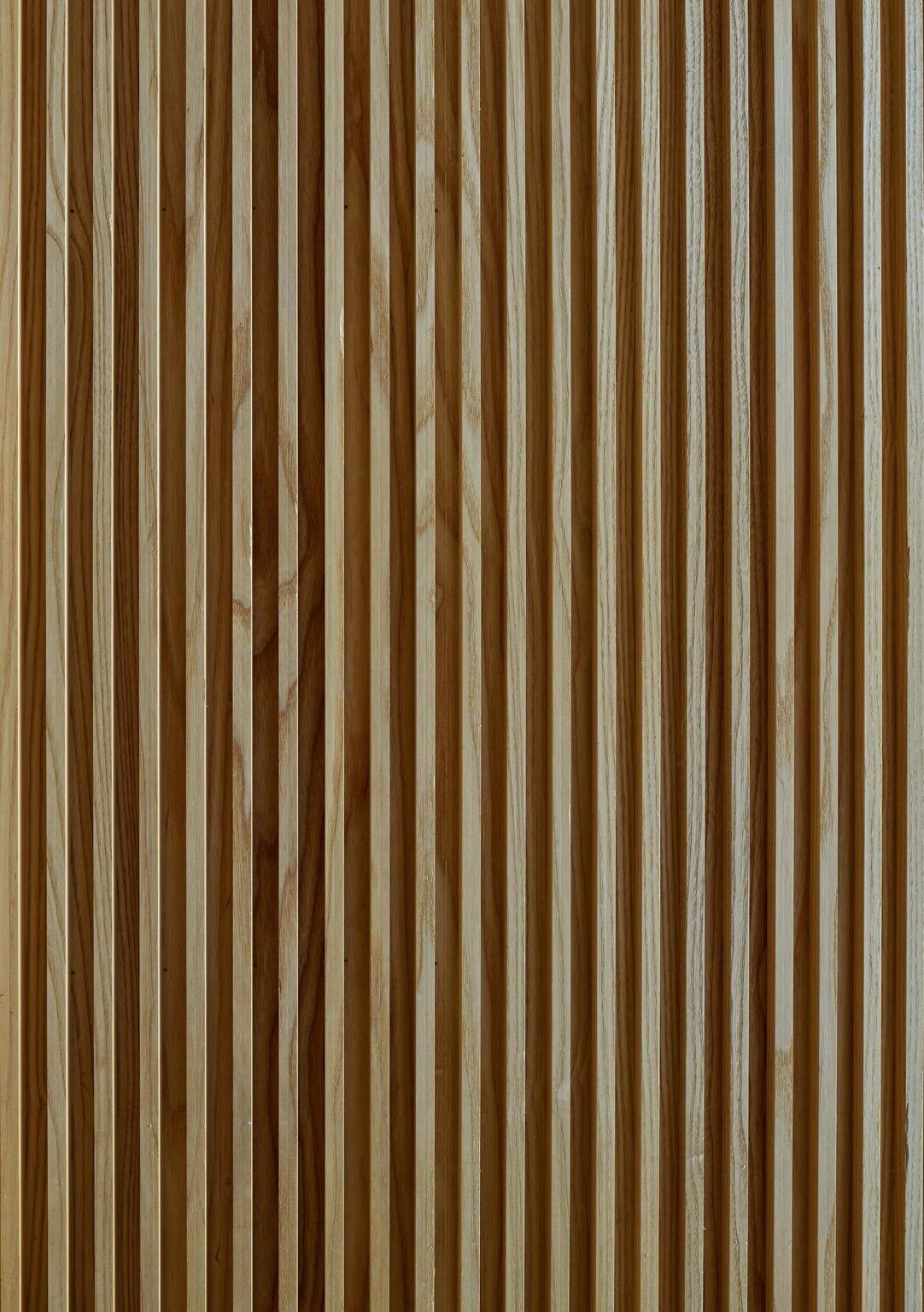 Close-up details of the wood highlight the natural materials that define this modern coastal home.