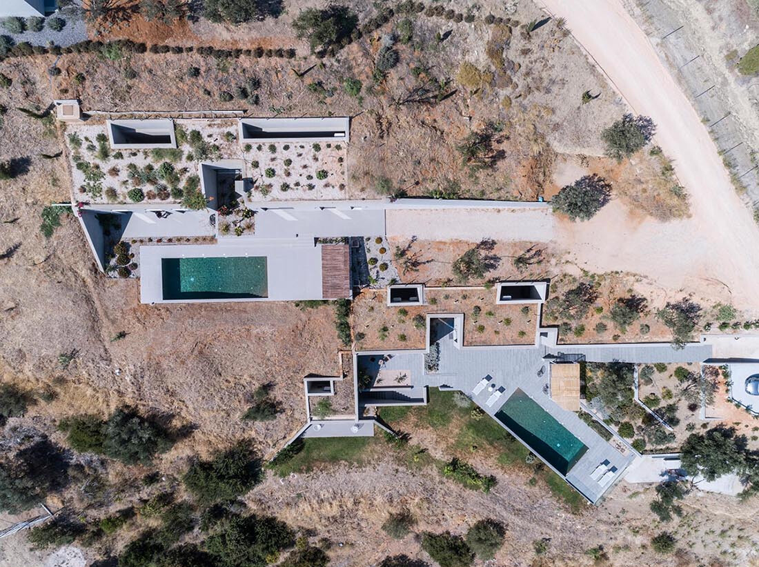 These hillside homes combine above-ground living with cave-like spaces, creating a seamless connection between architecture and terrain.