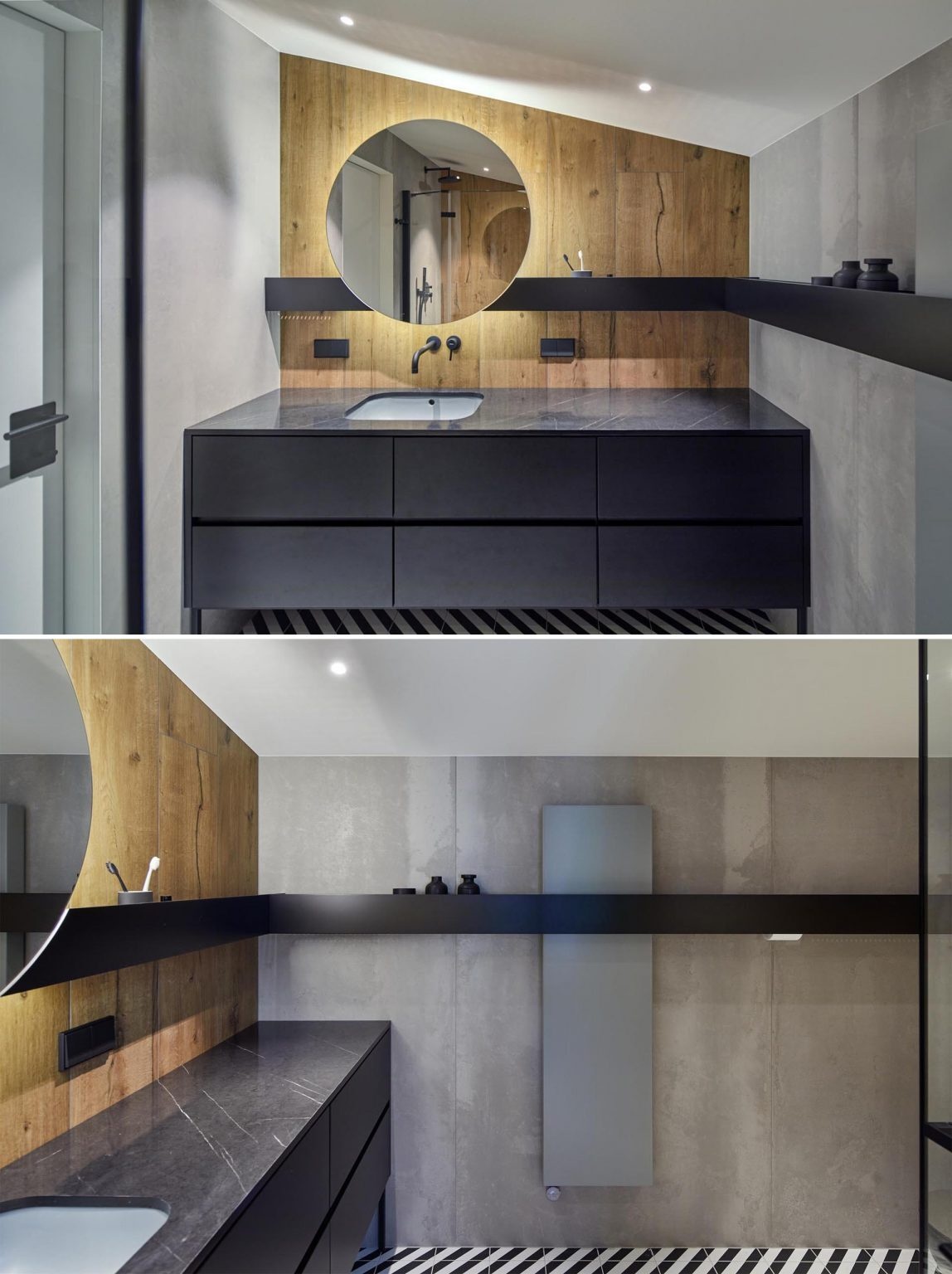 This bathroom features a wood accent wall paired with a backlit round mirror and a black shelf that wraps around the room.