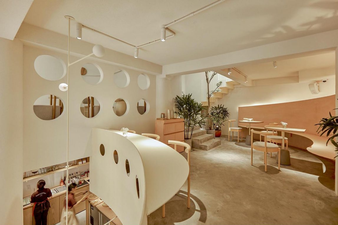 Multiple levels and varied seating options create a dynamic café experience from floor to floor.