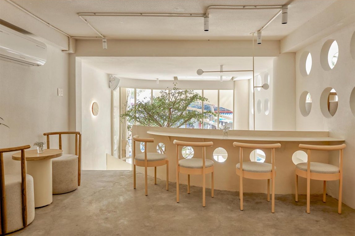 Multiple levels and varied seating options create a dynamic café experience from floor to floor.