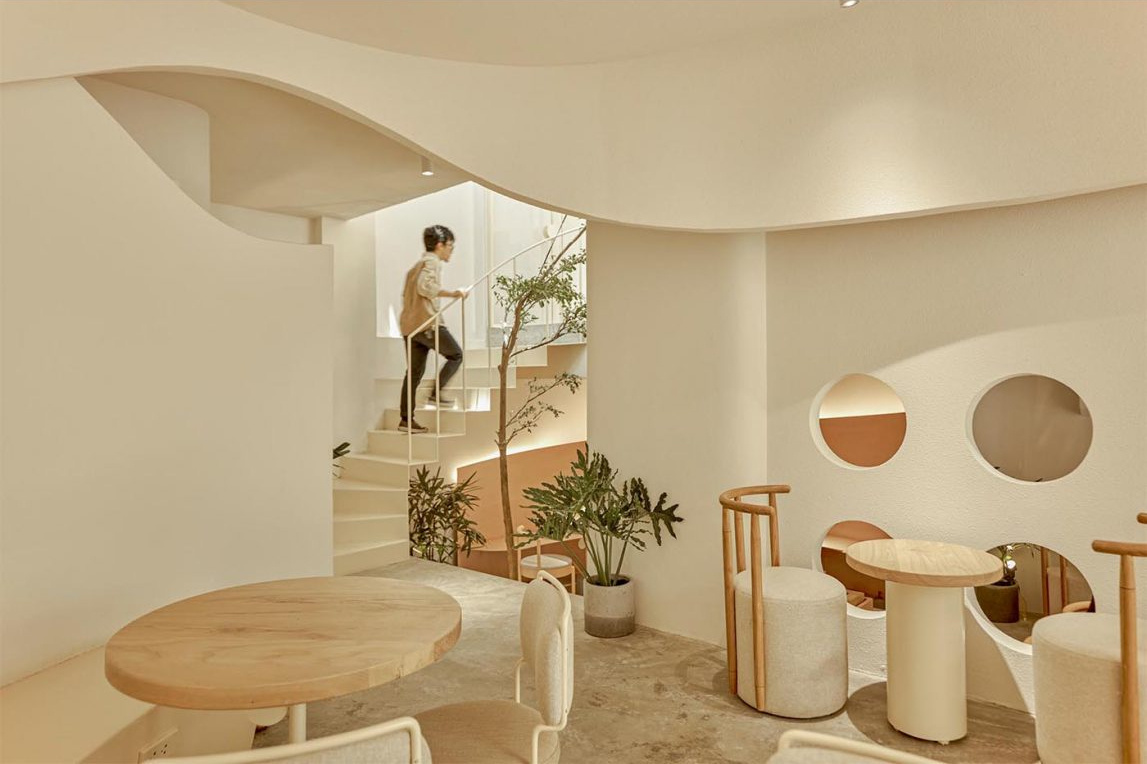 Multiple levels and varied seating options create a dynamic café experience from floor to floor.