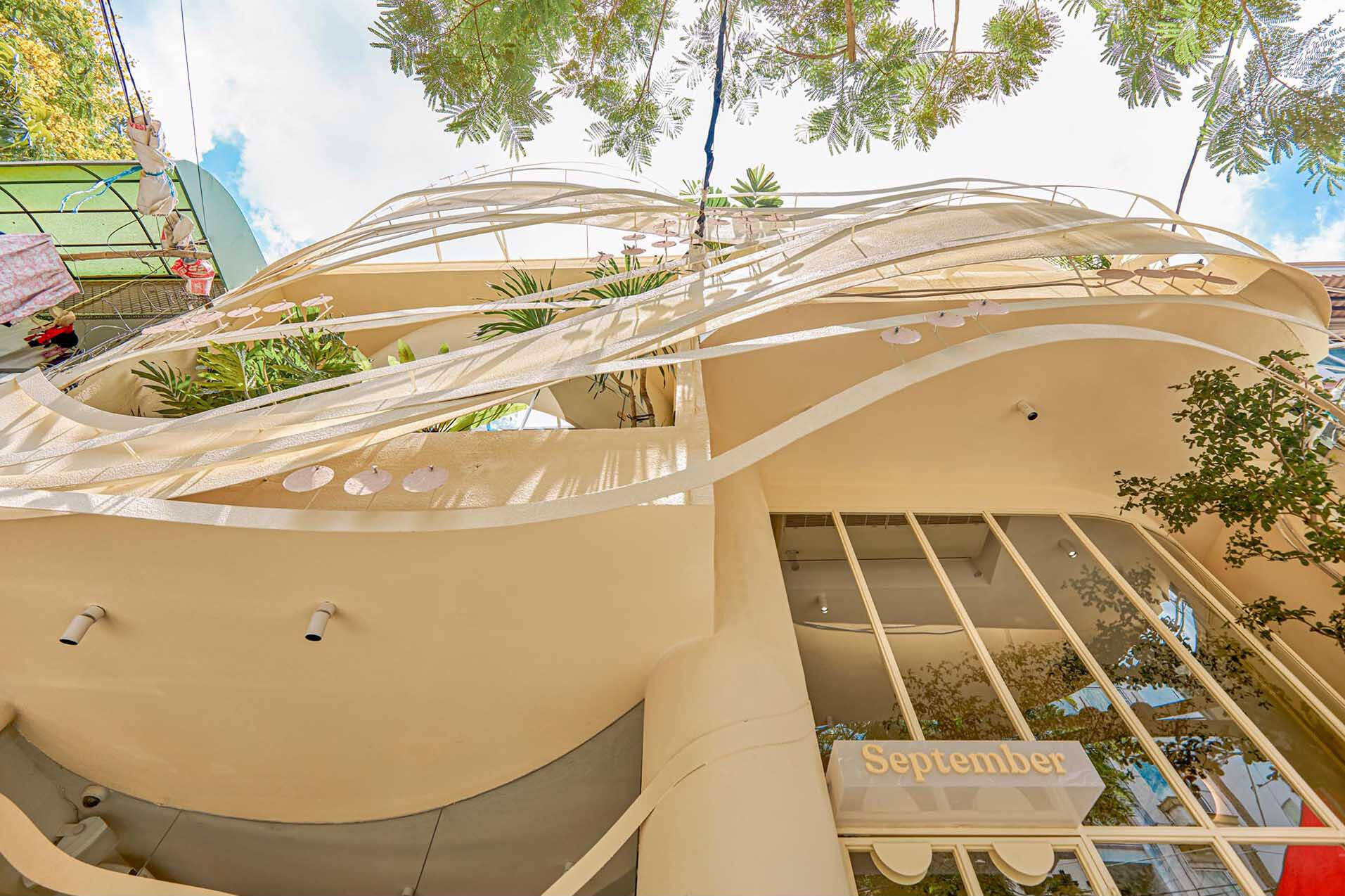 A striking coffee shop in Ho Chi Minh City designed with a bird’s nest concept, blending sculptural architecture with inviting café spaces.
