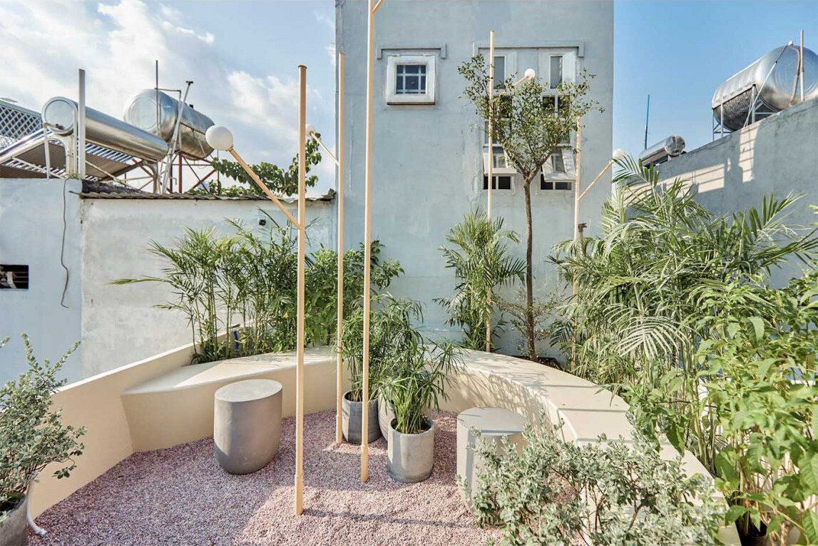 Layered outdoor seating areas offer different views and atmospheres across multiple café levels.