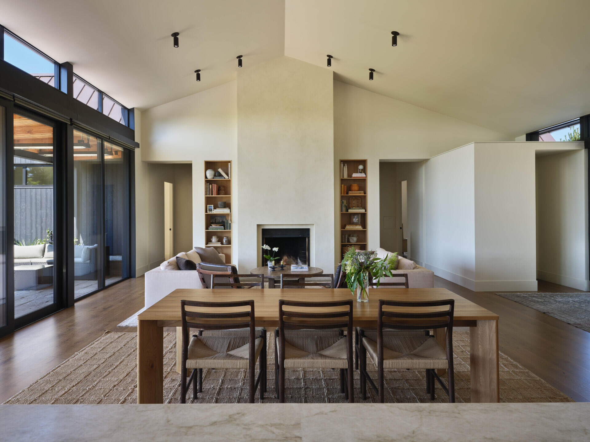 A bright dining space sits at the center of the home, perfect for both everyday meals and gatherings.