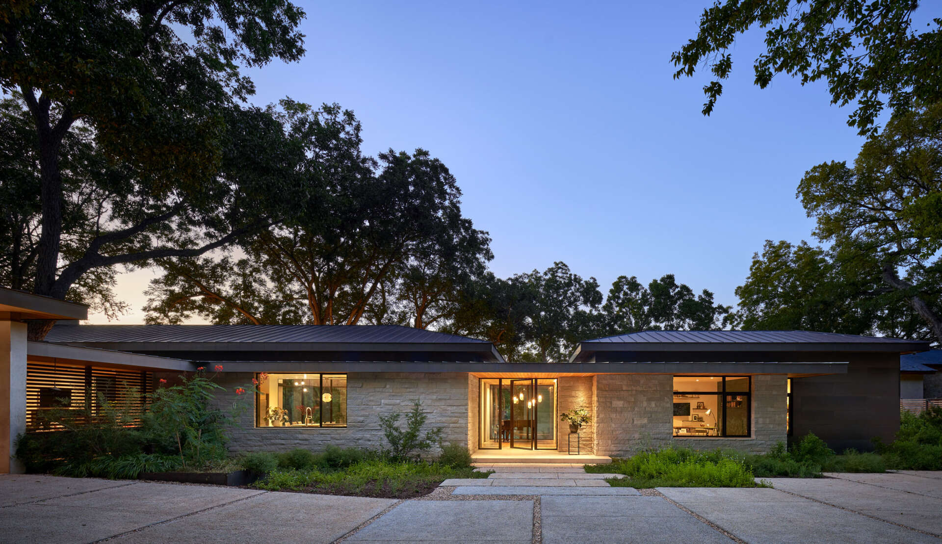 This Lake Austin home started as a simple 1950s cabin before a redesign removed later additions and revealed its unique hexagon form.