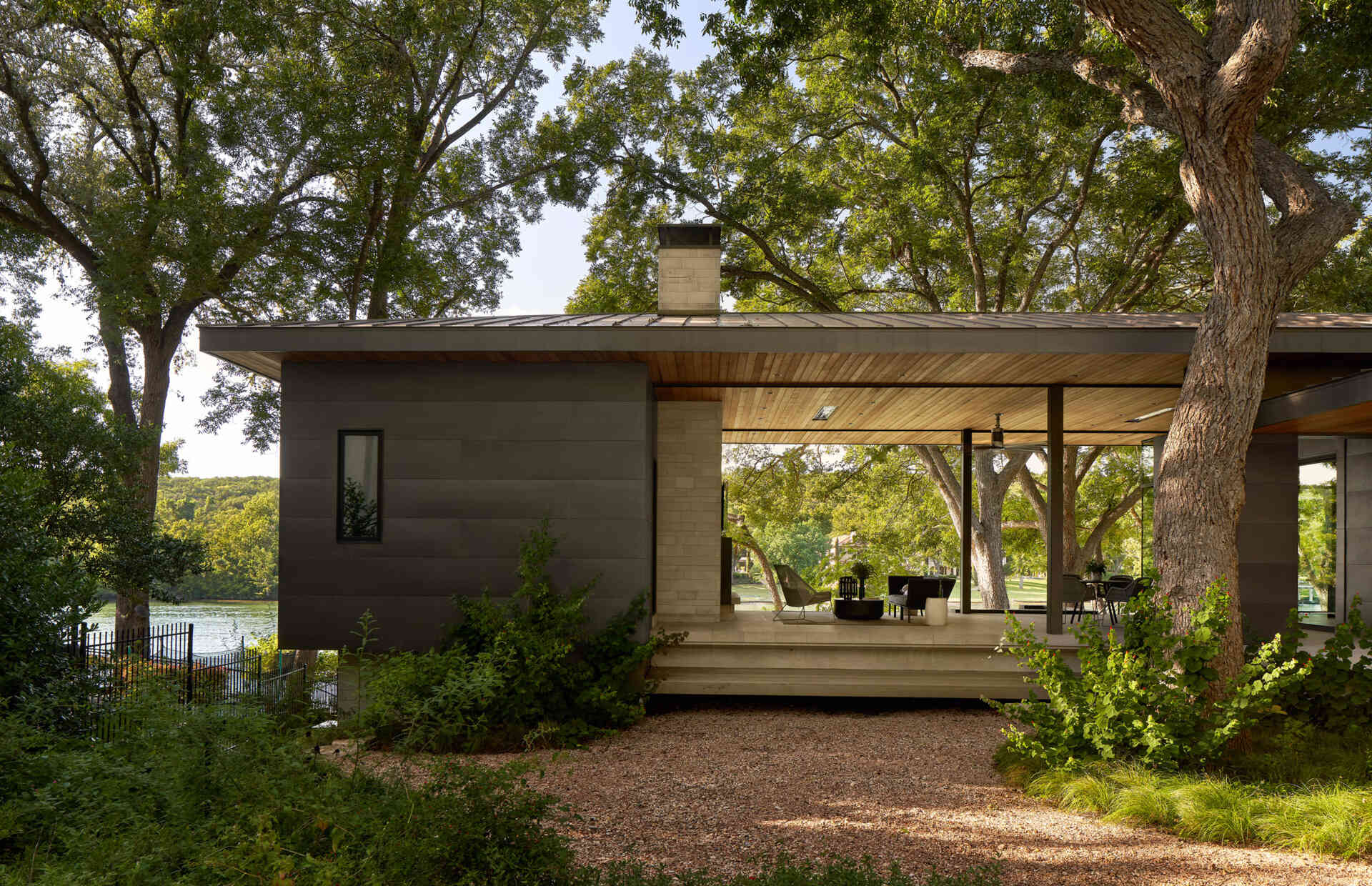 This Lake Austin home started as a simple 1950s cabin before a redesign removed later additions and revealed its unique hexagon form.