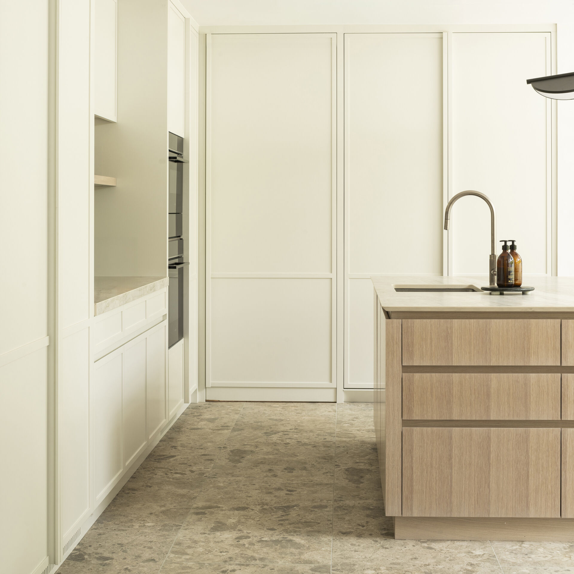 A modern kitchen with an island.