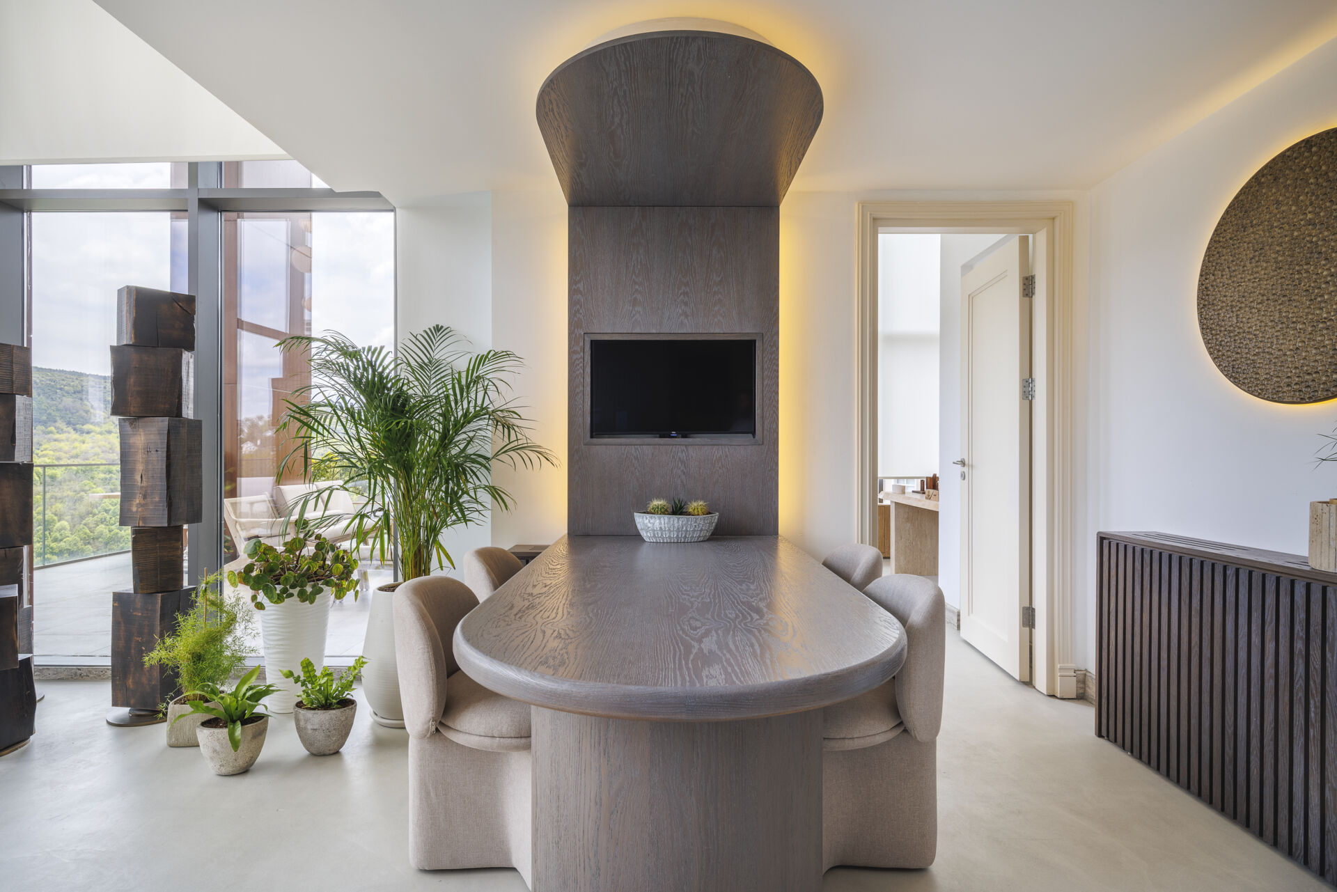 A balanced interior of a loft apartment, where contrast becomes harmony, blending softness, structure, light, and natural materials into one cohesive space.