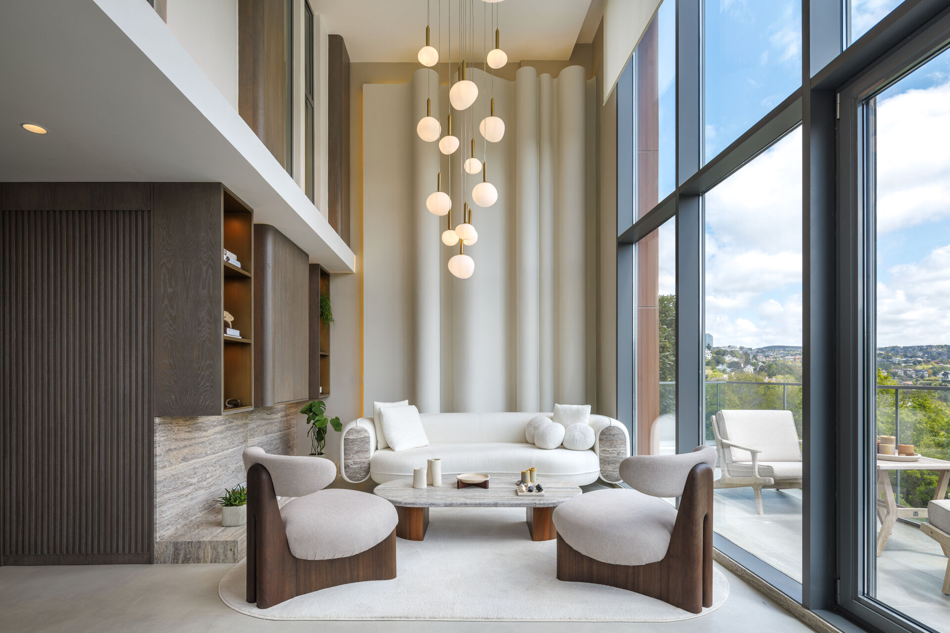 A balanced interior of a loft apartment, where contrast becomes harmony, blending softness, sculpture, structure, light, and natural materials into one cohesive space.