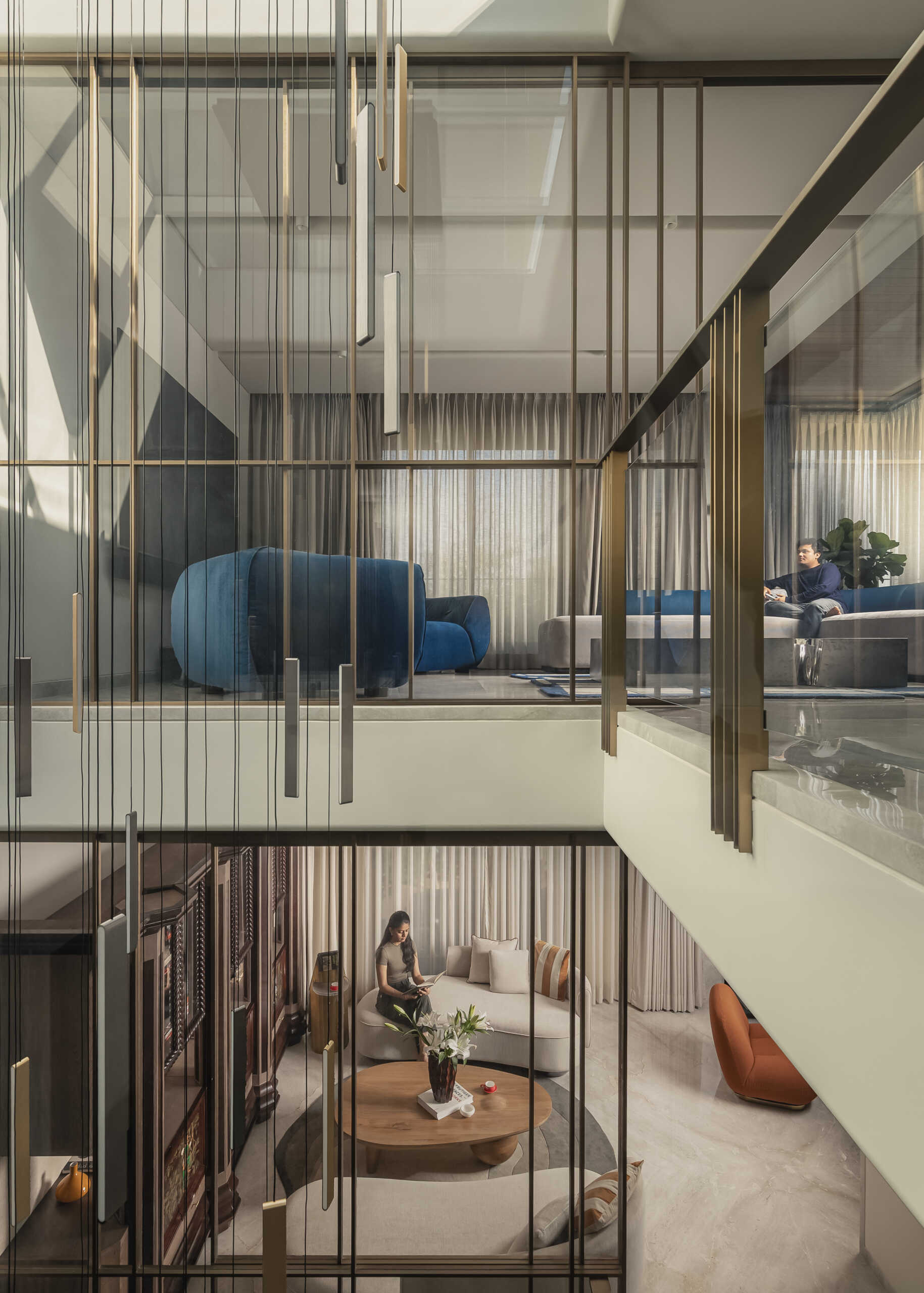 The library, located below the den, feels like a place that will evolve over time, especially as objects, books, and collected pieces fill the shelves.