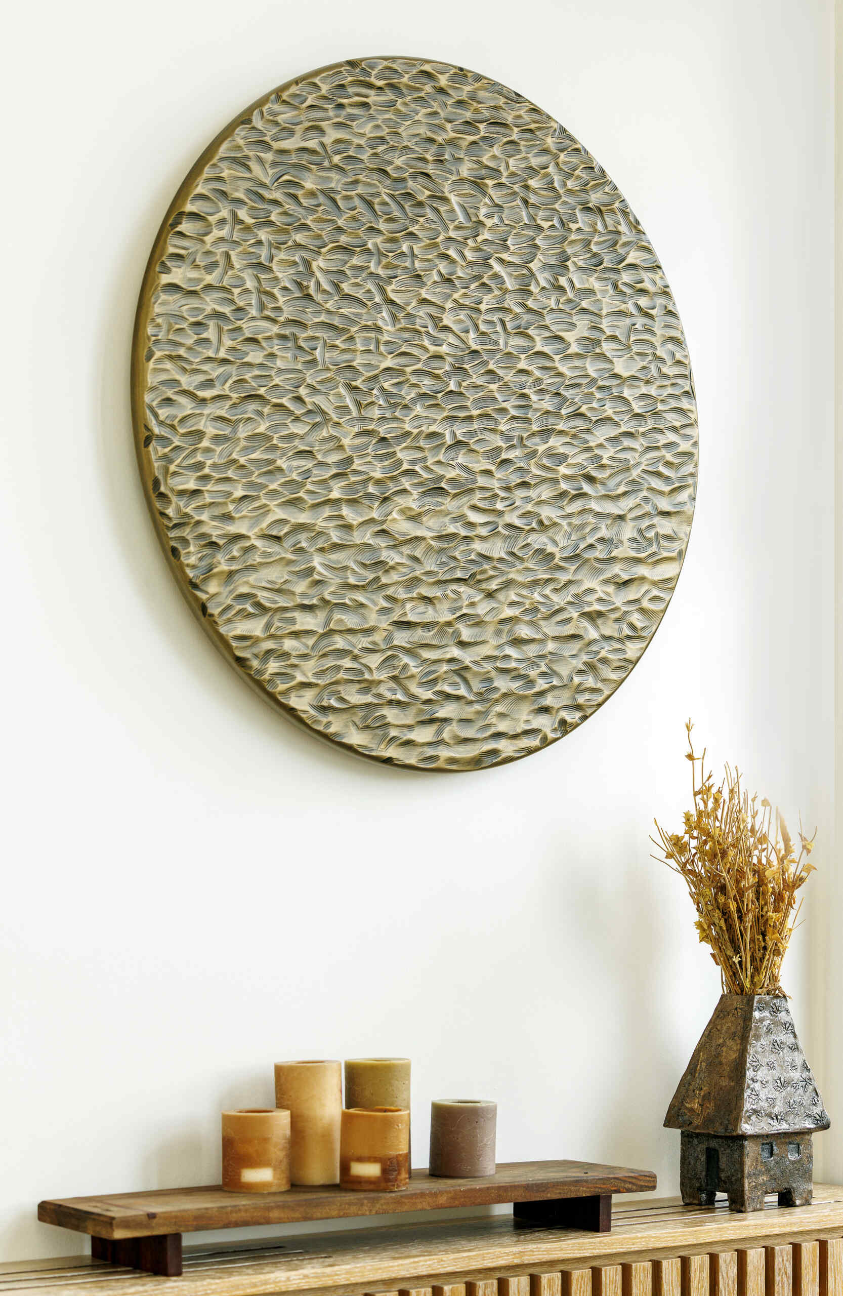 Custom furniture, layered scents, and curated objects transform this loft into a fully immersive interior experience.