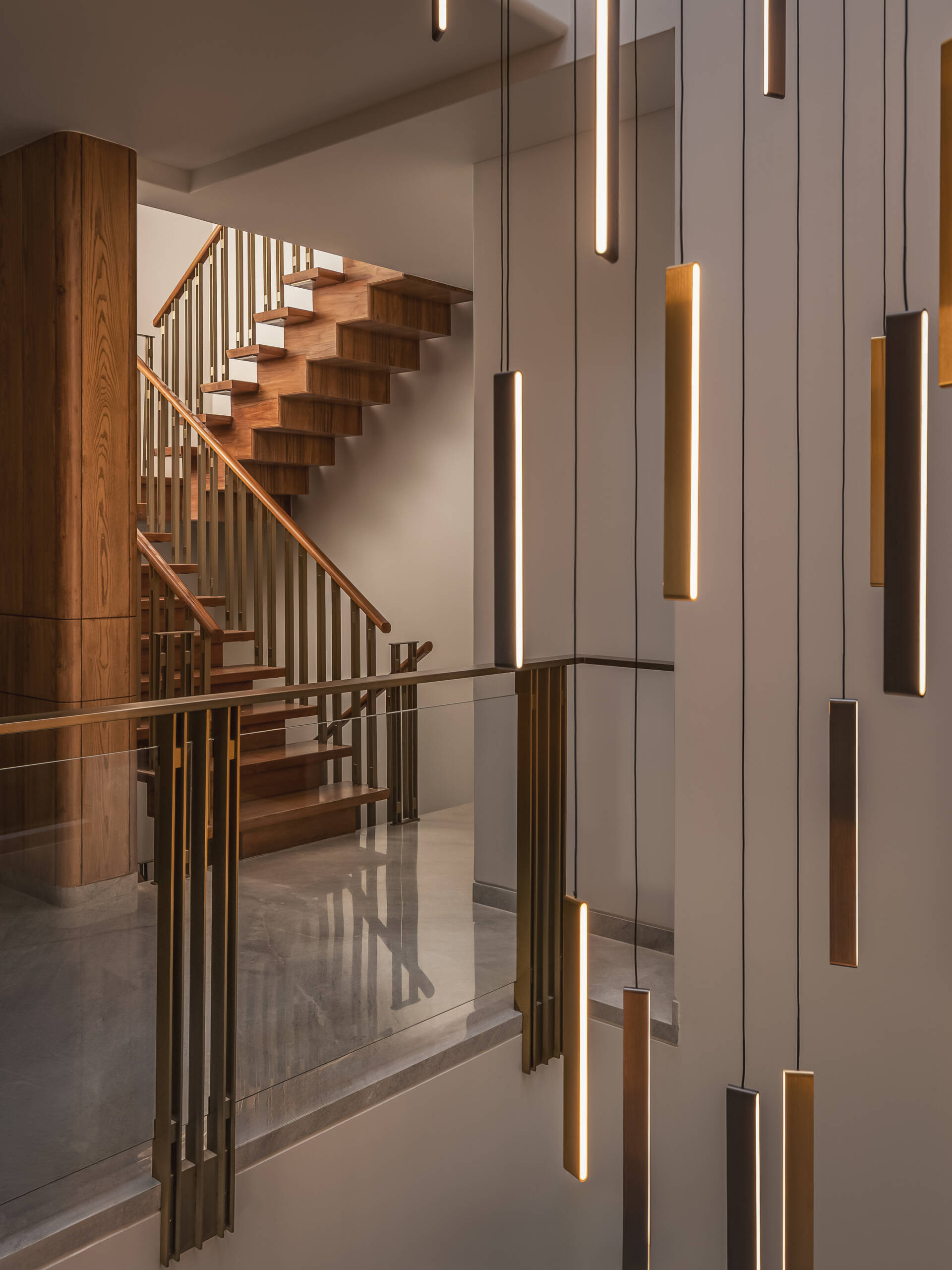 As you move upward through the home, the staircase acts as a transition point, introducing each level.