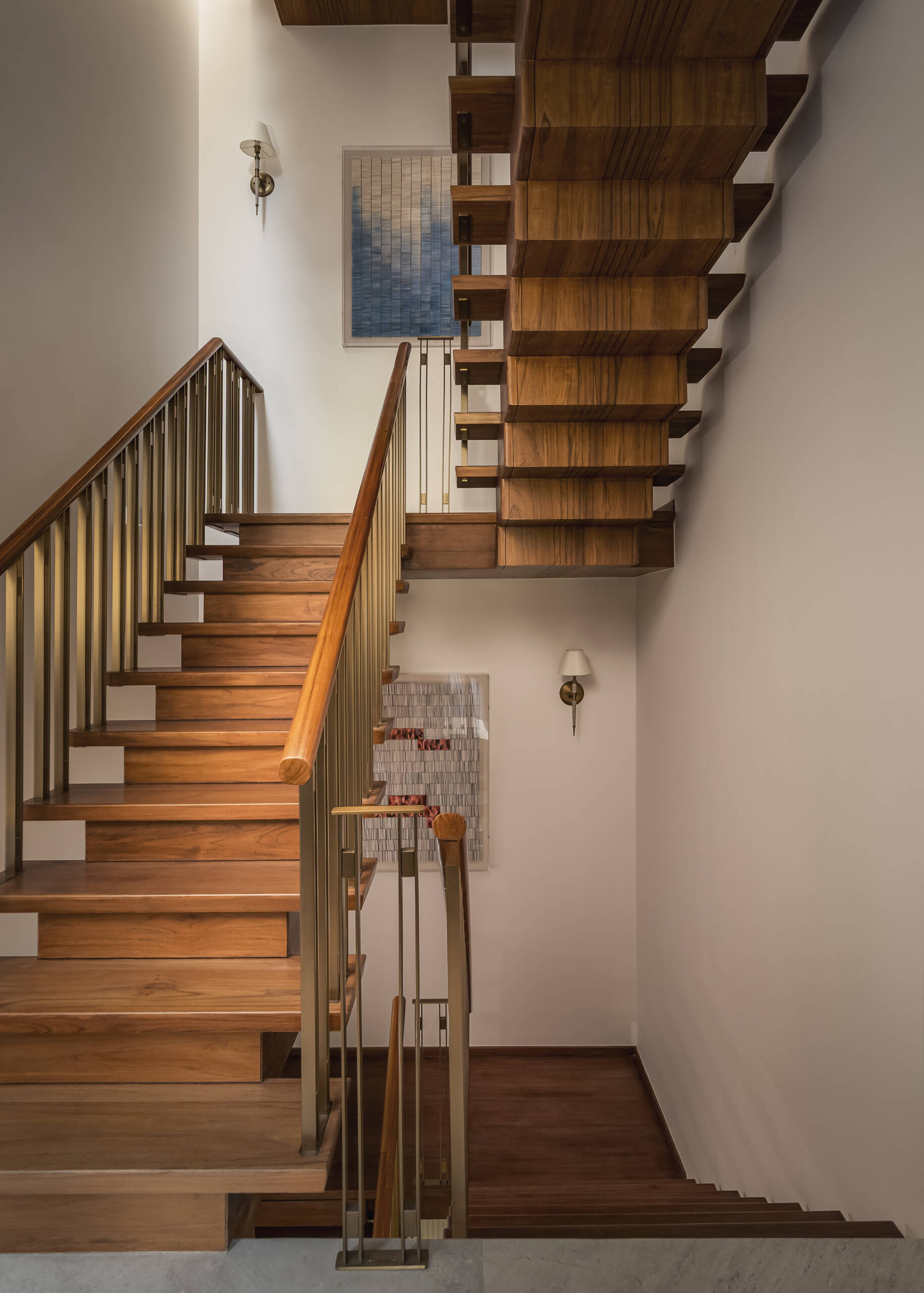 As you move upward through the home, the staircase acts as a transition point, introducing each level.