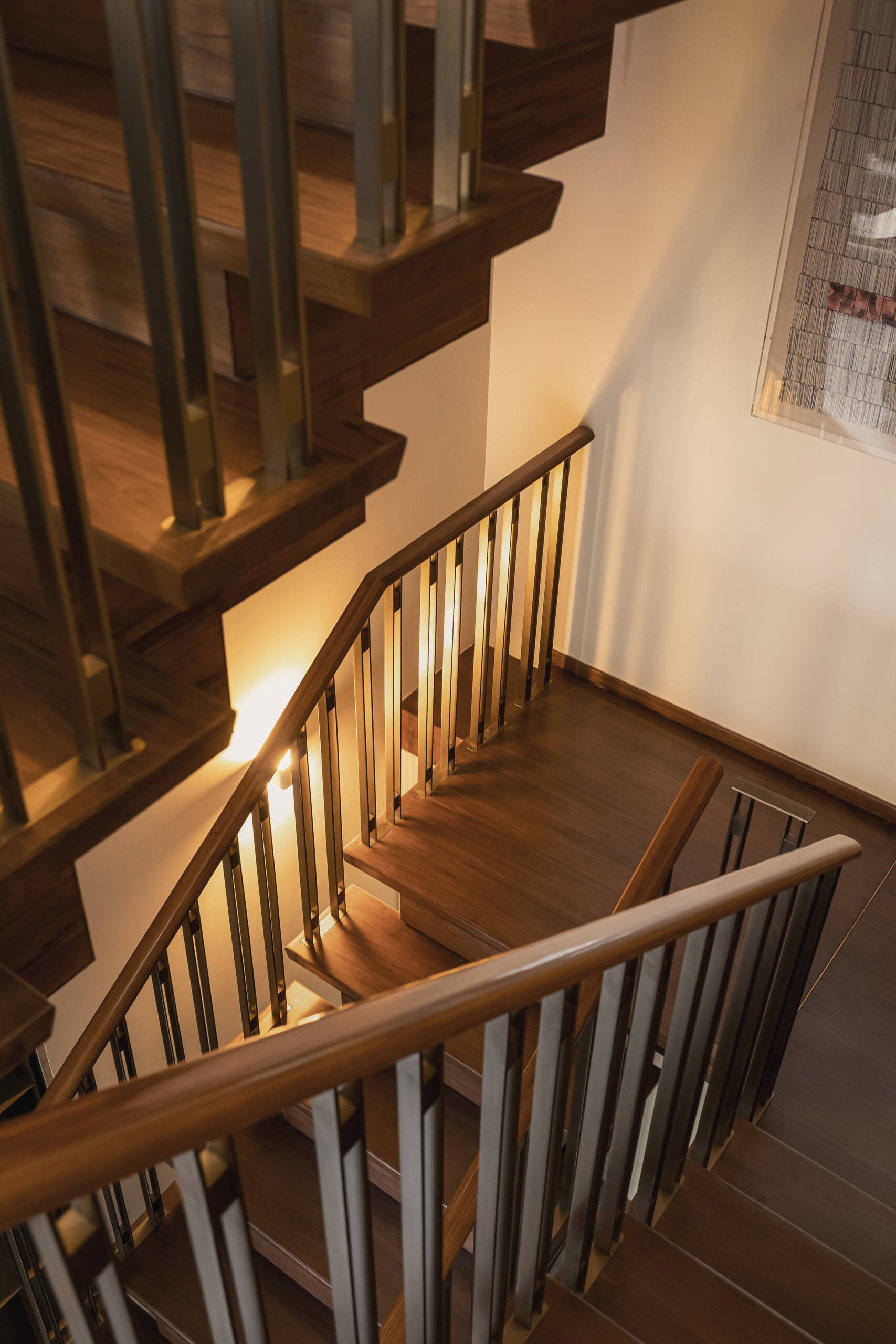 As you move upward through the home, the staircase acts as a transition point, introducing each level.