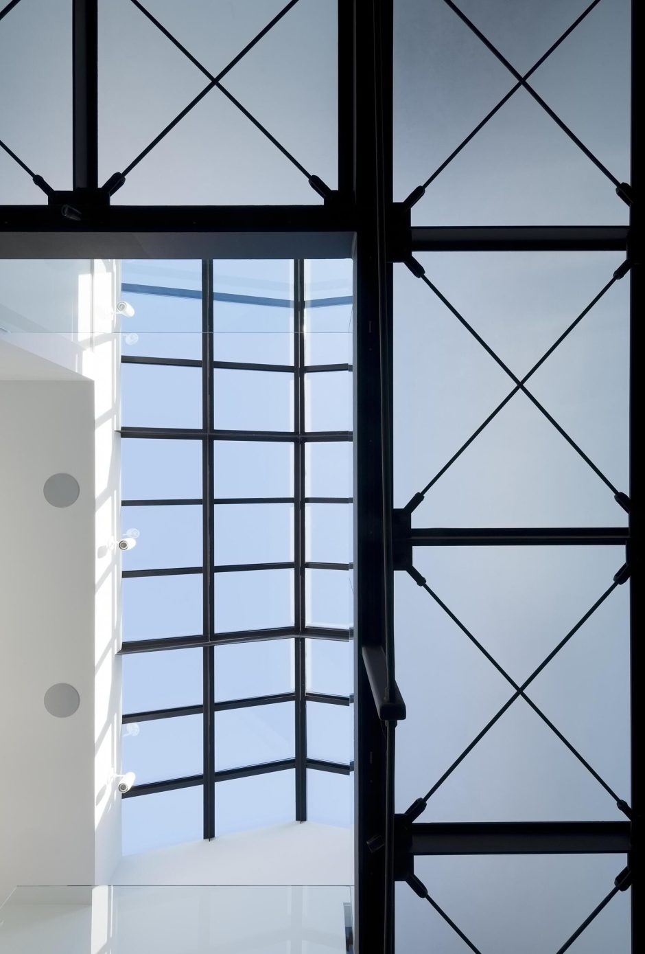 Inside a Remodel Where a Double-Height Dining Atrium Transforms the Space