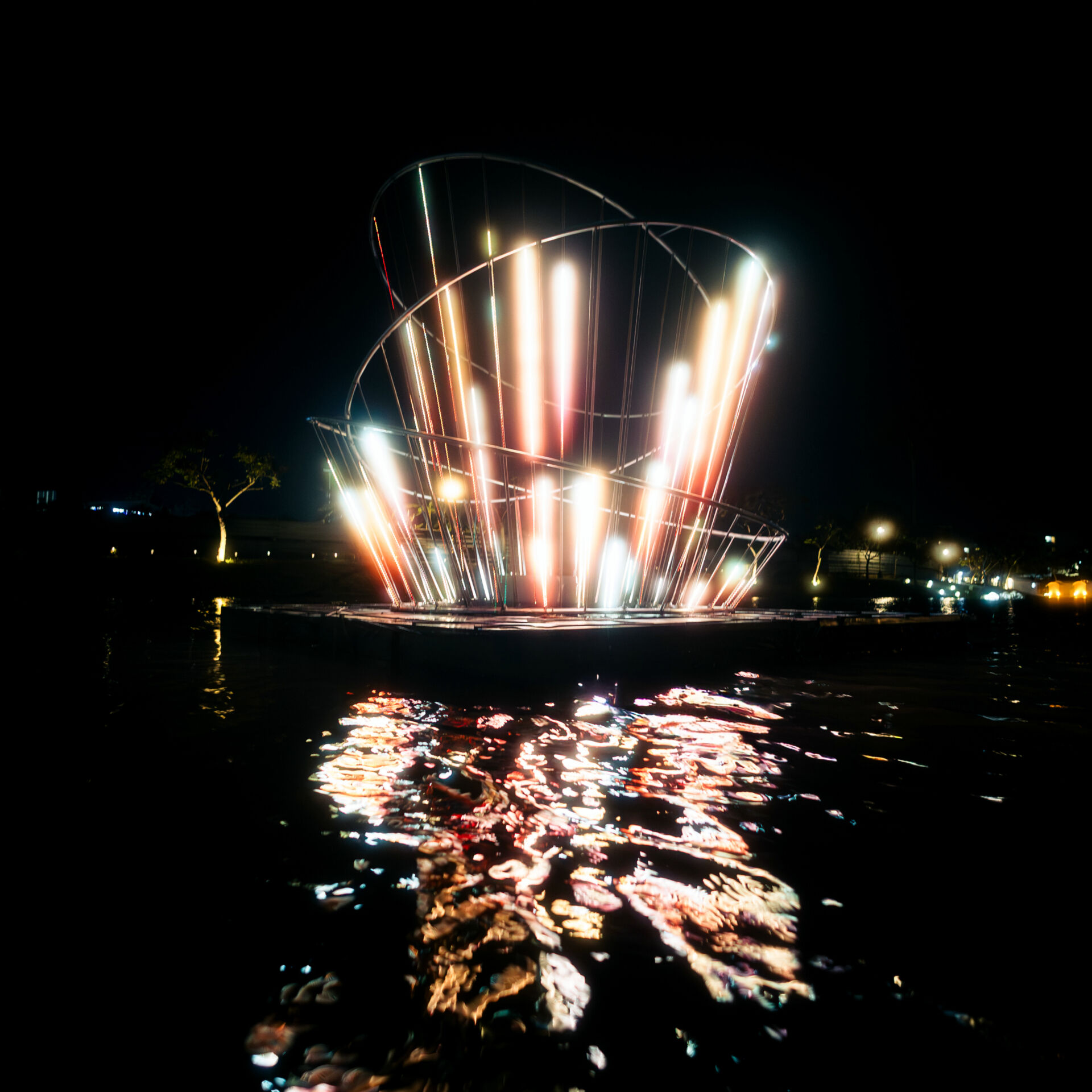 The Beehive Fireworks is a unique ritual in Tainan, Taiwan, symbolizing purification. The installation senses the audience through shoreside cameras. By subtly translating their posture into the dynamic rhythm of beehive firecrackers, it recreates the temporal experience of the ritual.