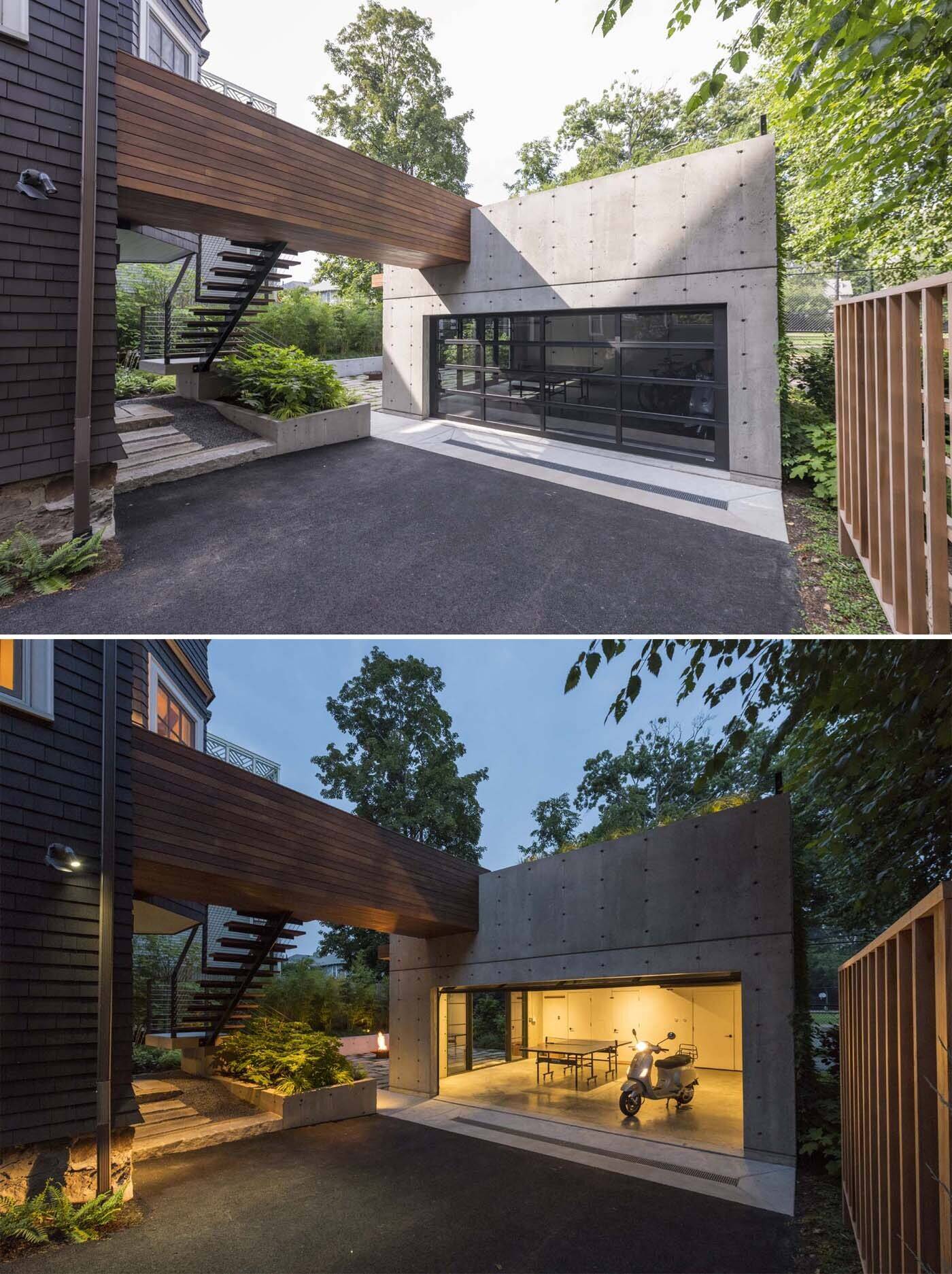 This modern Brookline garage pavilion connects to a Victorian home through a wood bridge and includes entertaining spaces, a sauna, and a rooftop deck.
