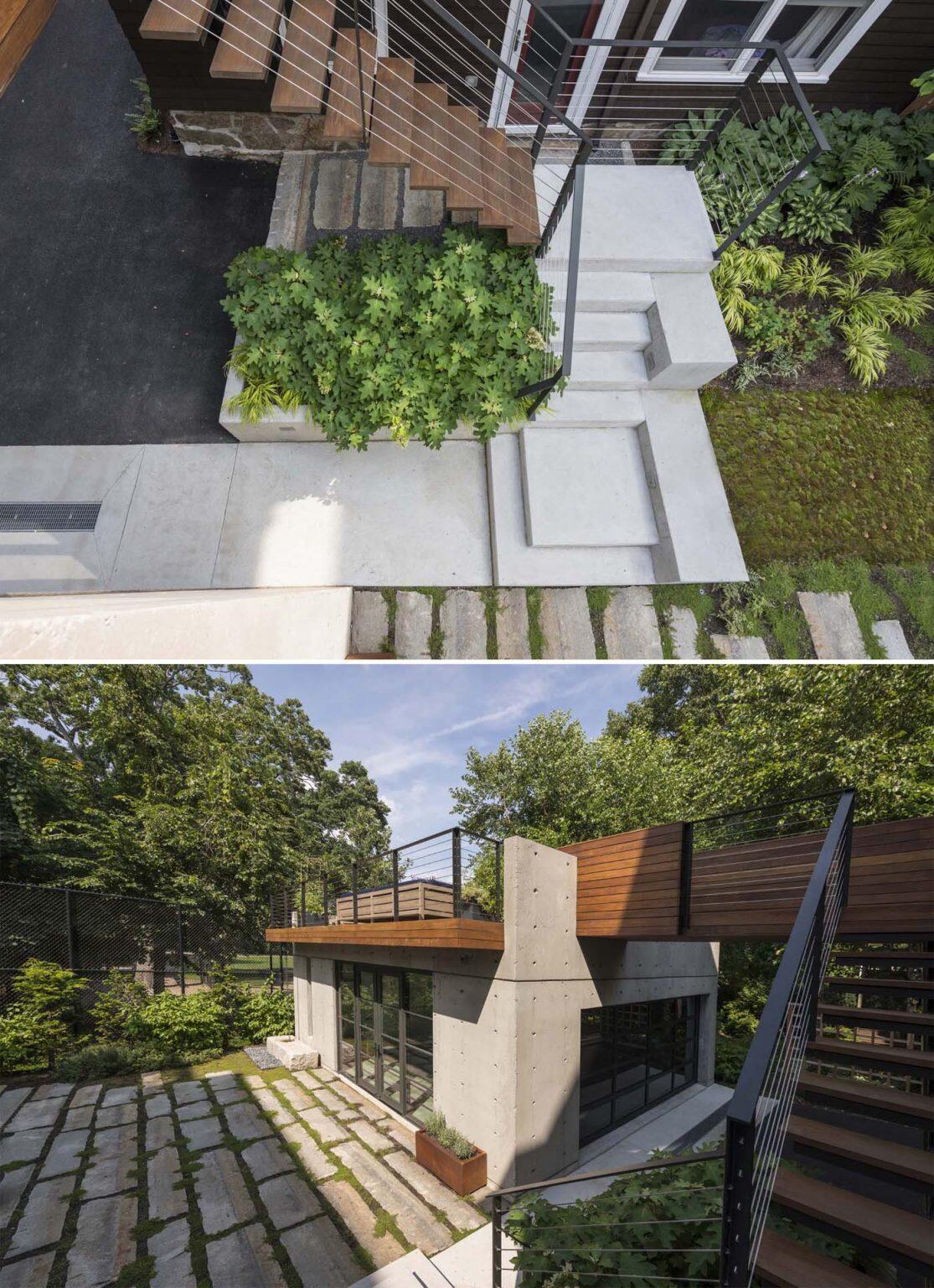 A landscaped courtyard with granite, moss, bamboo, and a fire pit creates a cozy outdoor gathering space beneath this modern garage pavilion.