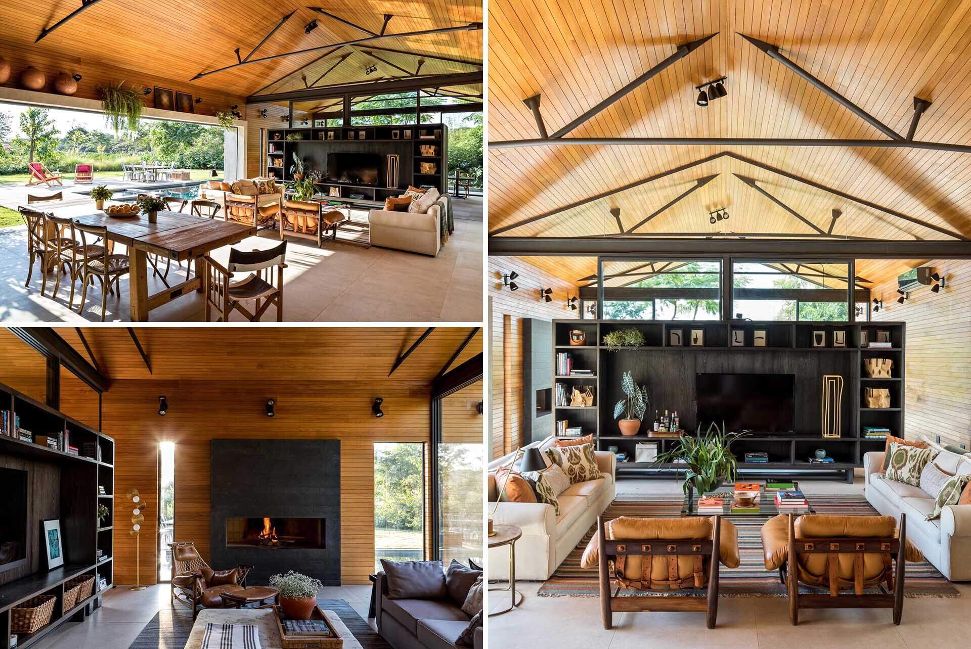 A custom wood and steel divider creates two connected living spaces, blending openness with structure and adding built-in shelving with a TV feature.
