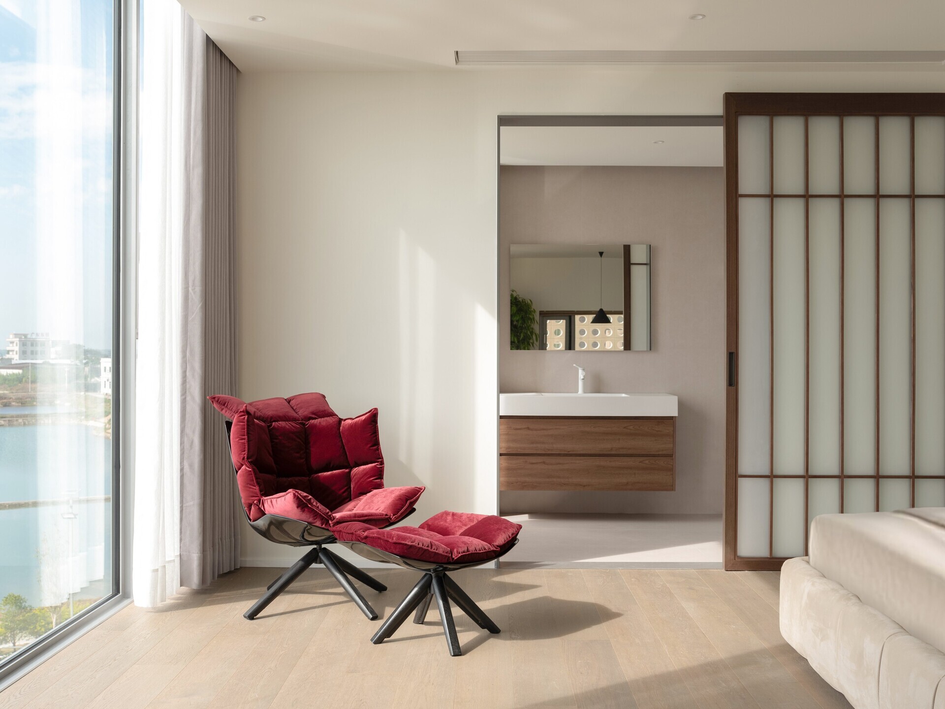 A modern bedroom and ensuite bathroom.
