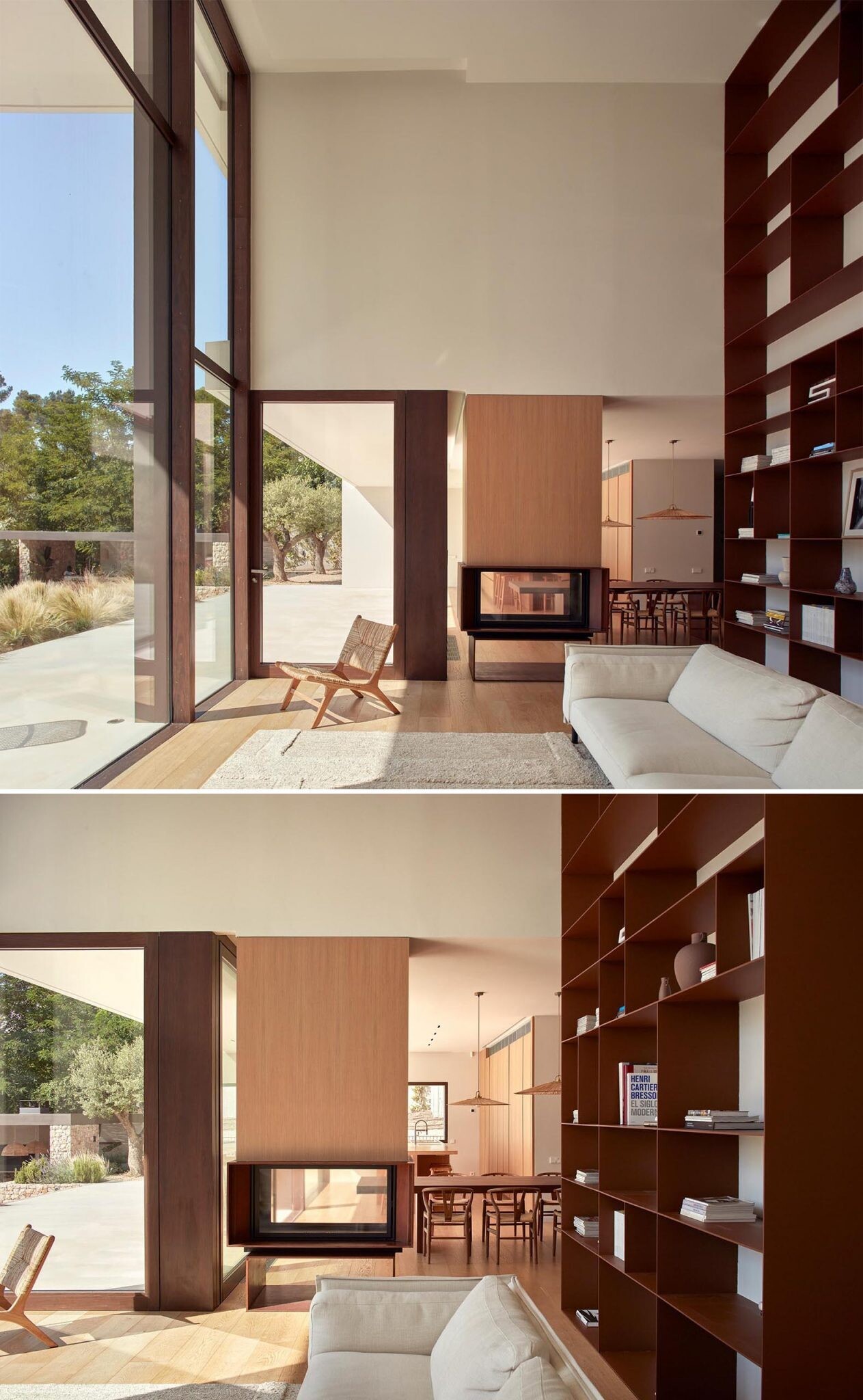 Warm wood interiors, a double-height living room, and huge forest-facing windows define this modern home near Barcelona.