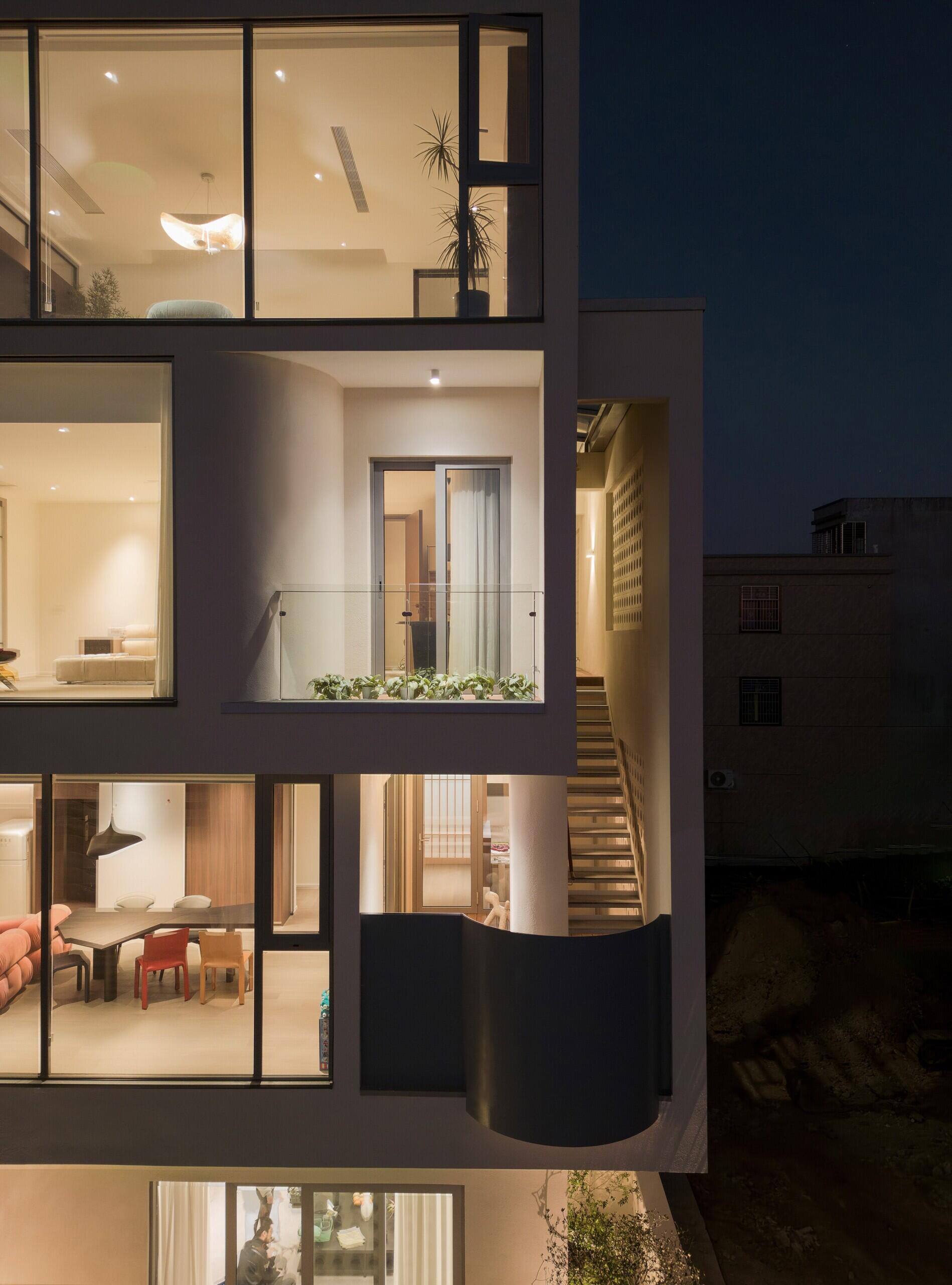 Coastal Villa Residence in Raoping, China by VALUE WORKS ARCHITECTS rethinks rural family living with split-level interiors, sea views and modern multi-generational design on a compact coastal site.