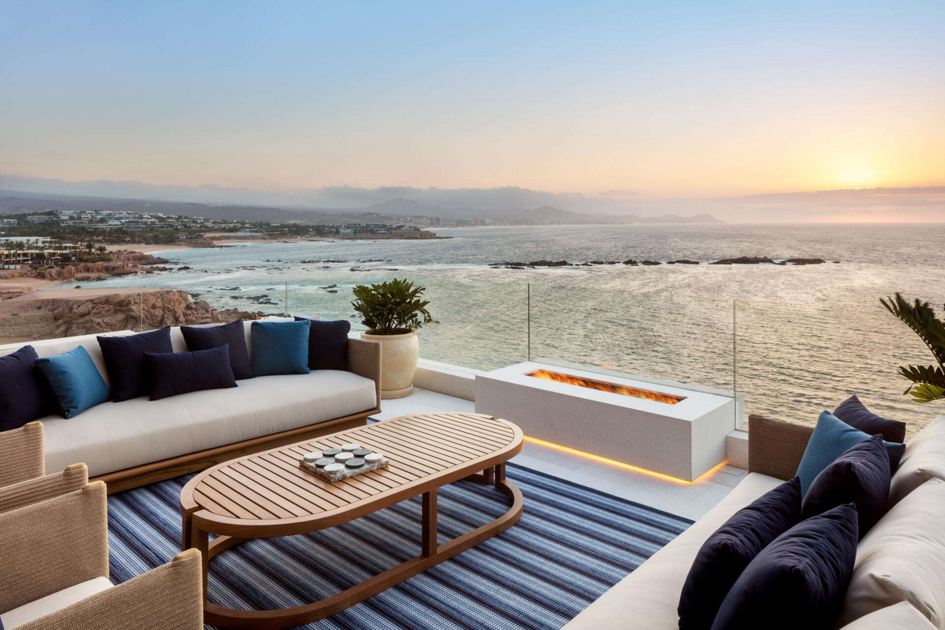 An infinity pool, outdoor dining, and expansive oceanfront lounges define this incredible Los Cabos patio design.