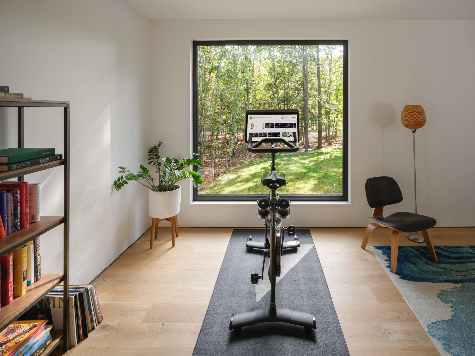 A flexible upstairs gym space in this Maine home can also function as a playroom, office, or casual lounge.
