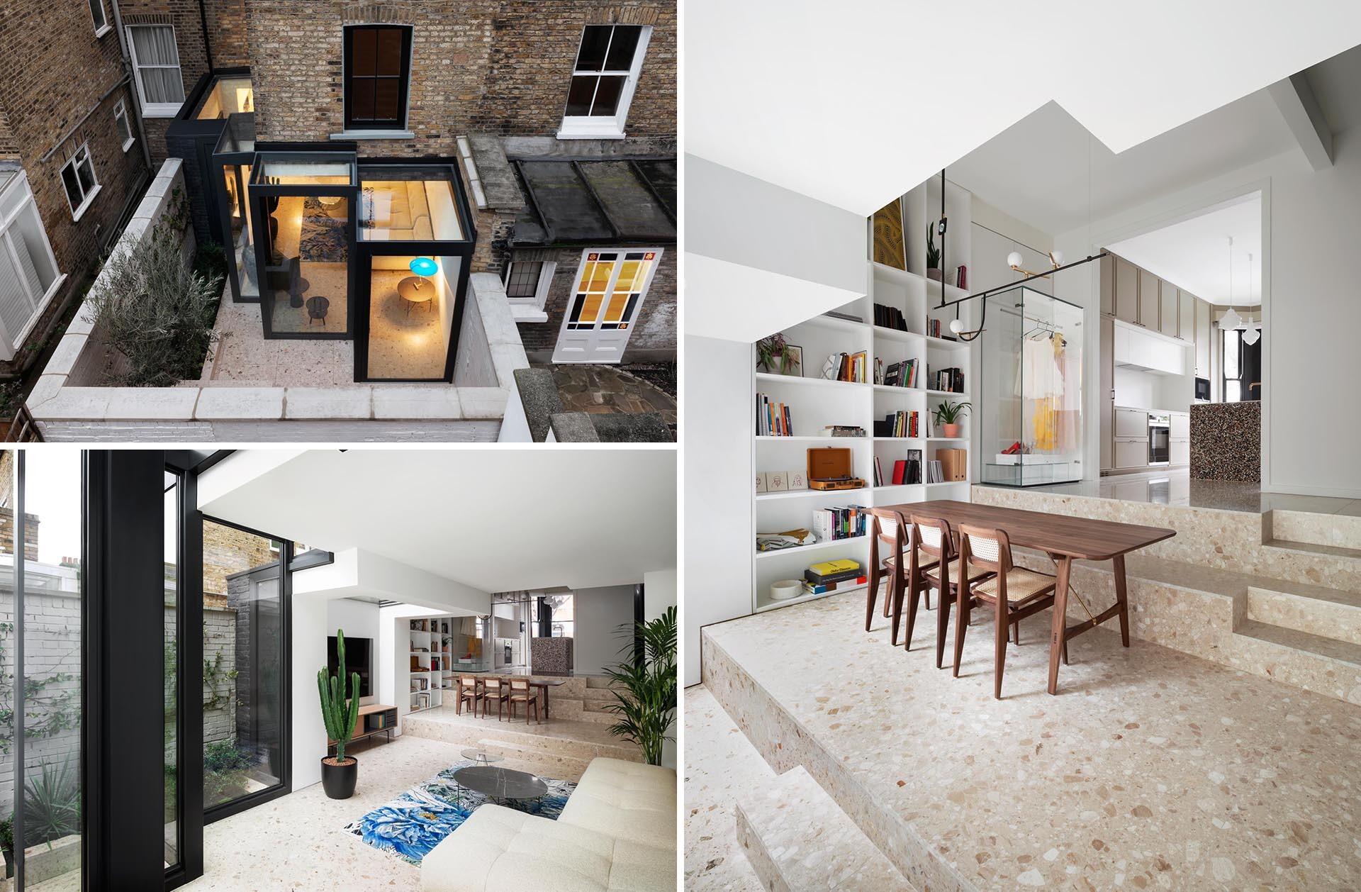 A Victorian terraced house in London transformed with cubist glass volumes, black steel framing, and dramatic geometric forms by Bureau de Change Architects.