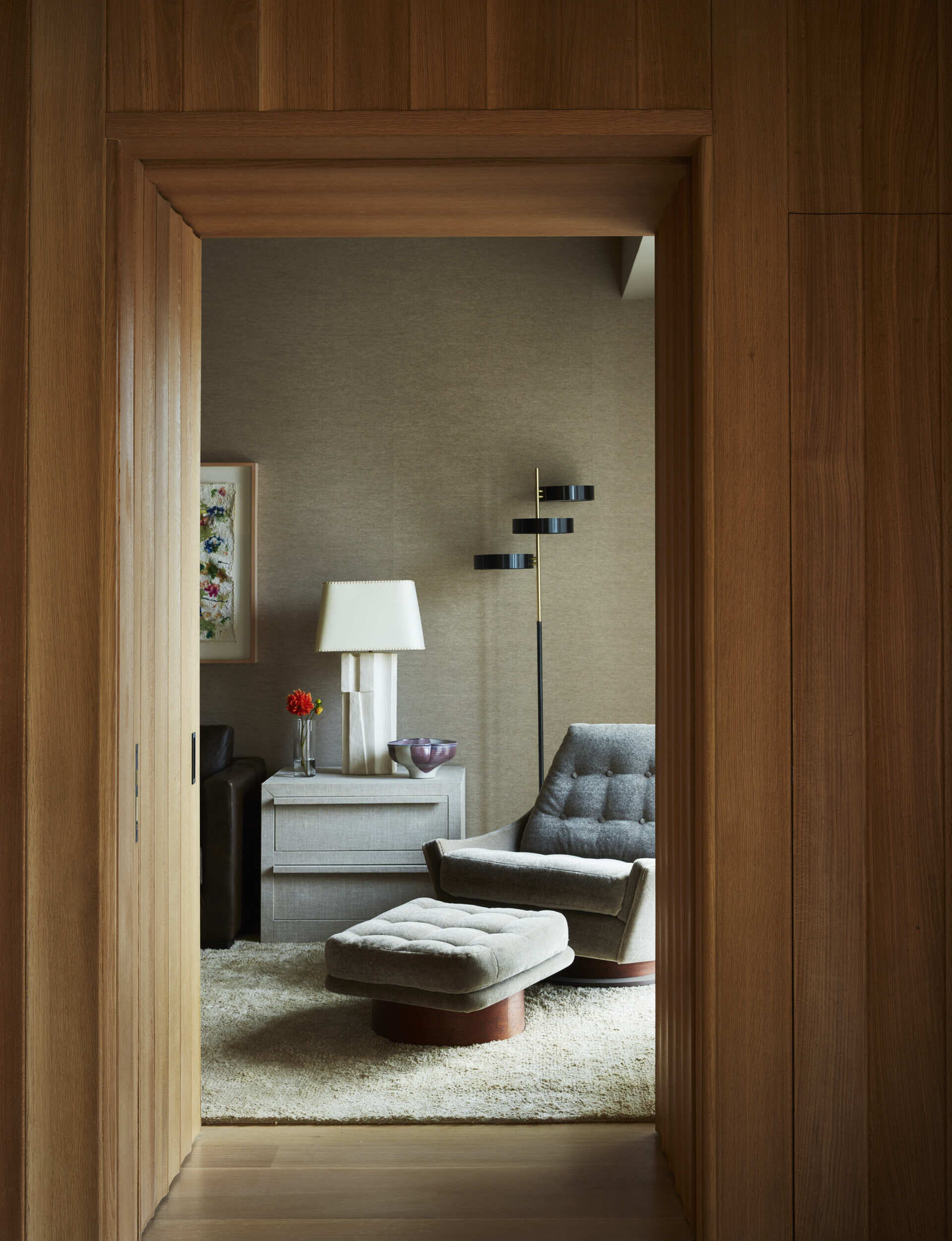 Warm tones, layered fabrics, and soft textures make this modern loft feel relaxed and welcoming.