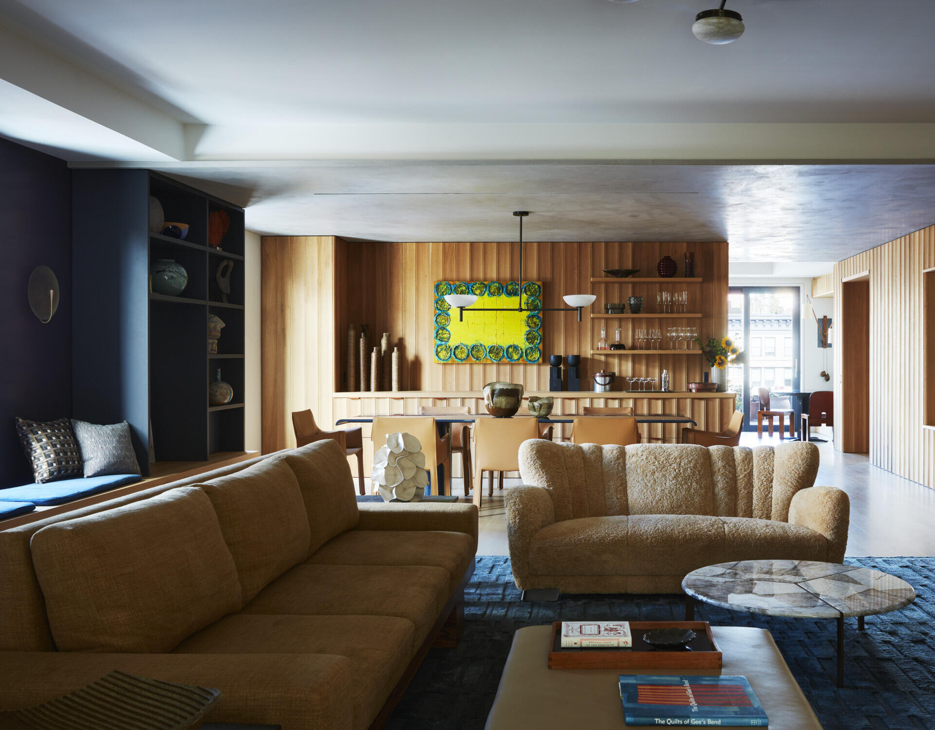 A warm and art-filled New York loft renovation featuring custom White Oak interiors, layered textures, and sophisticated family-friendly design.