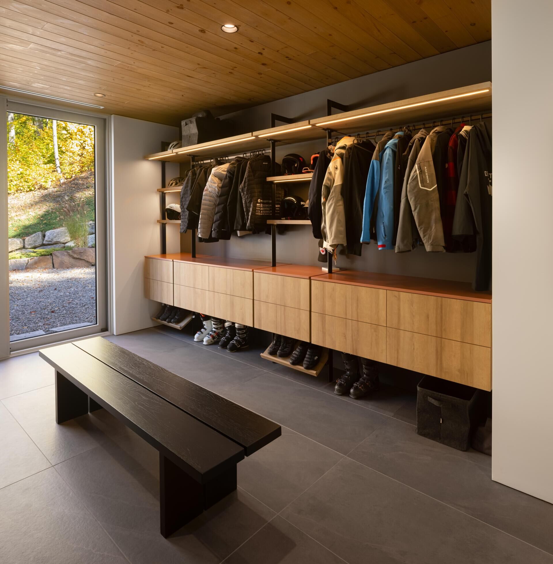 This oversized mudroom combines practical storage with warm modern design for life in Québec’s mountain landscape.