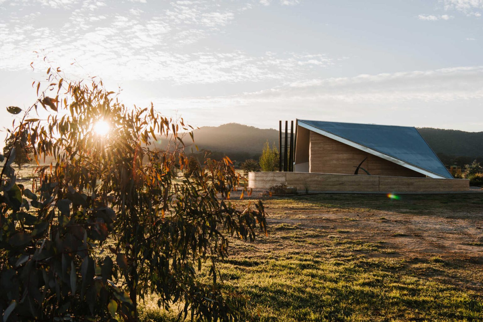 A Collection of Off-Grid Cabins with a Fire-Led Events Space