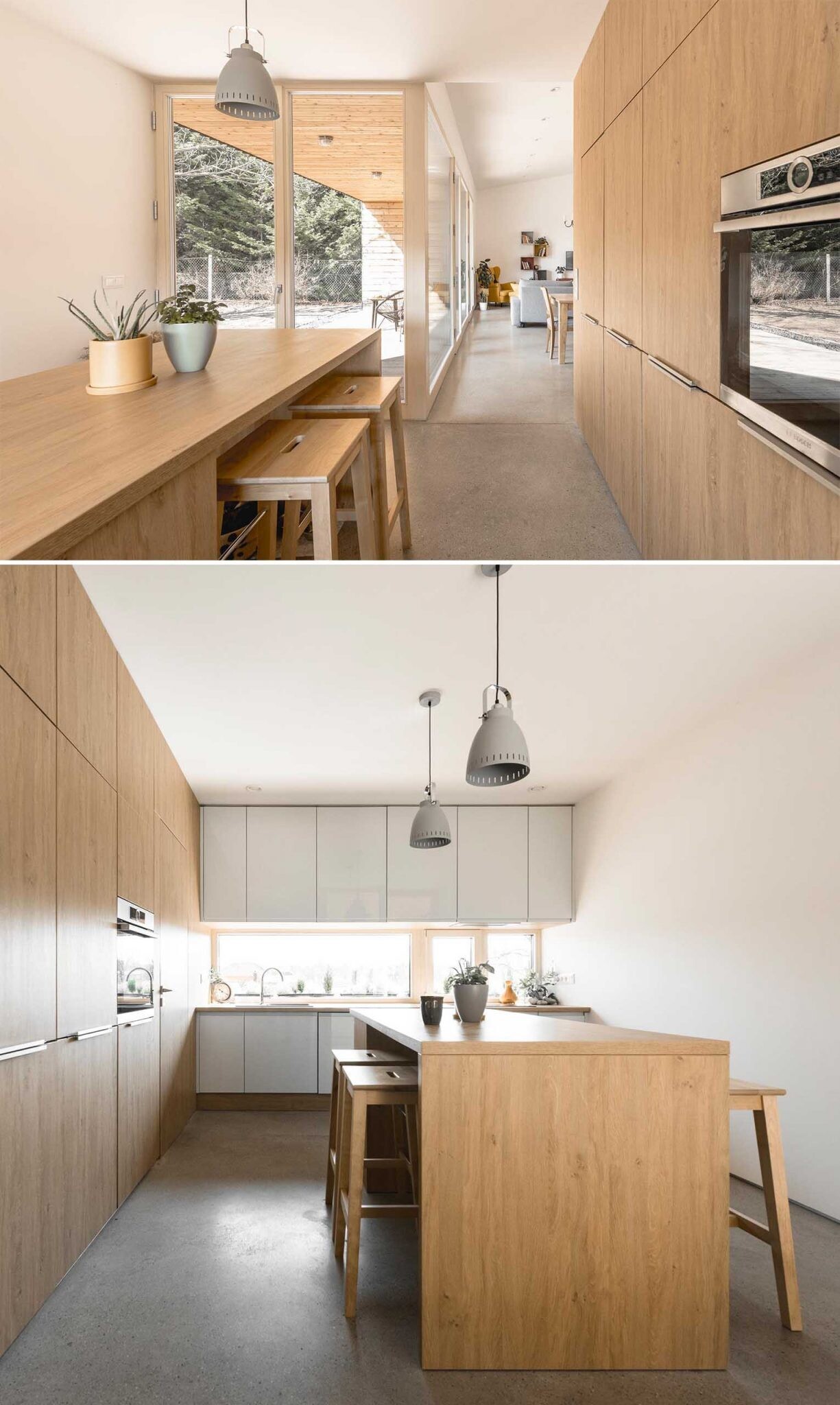 A modern white, wood, and light grey kitchen design.
